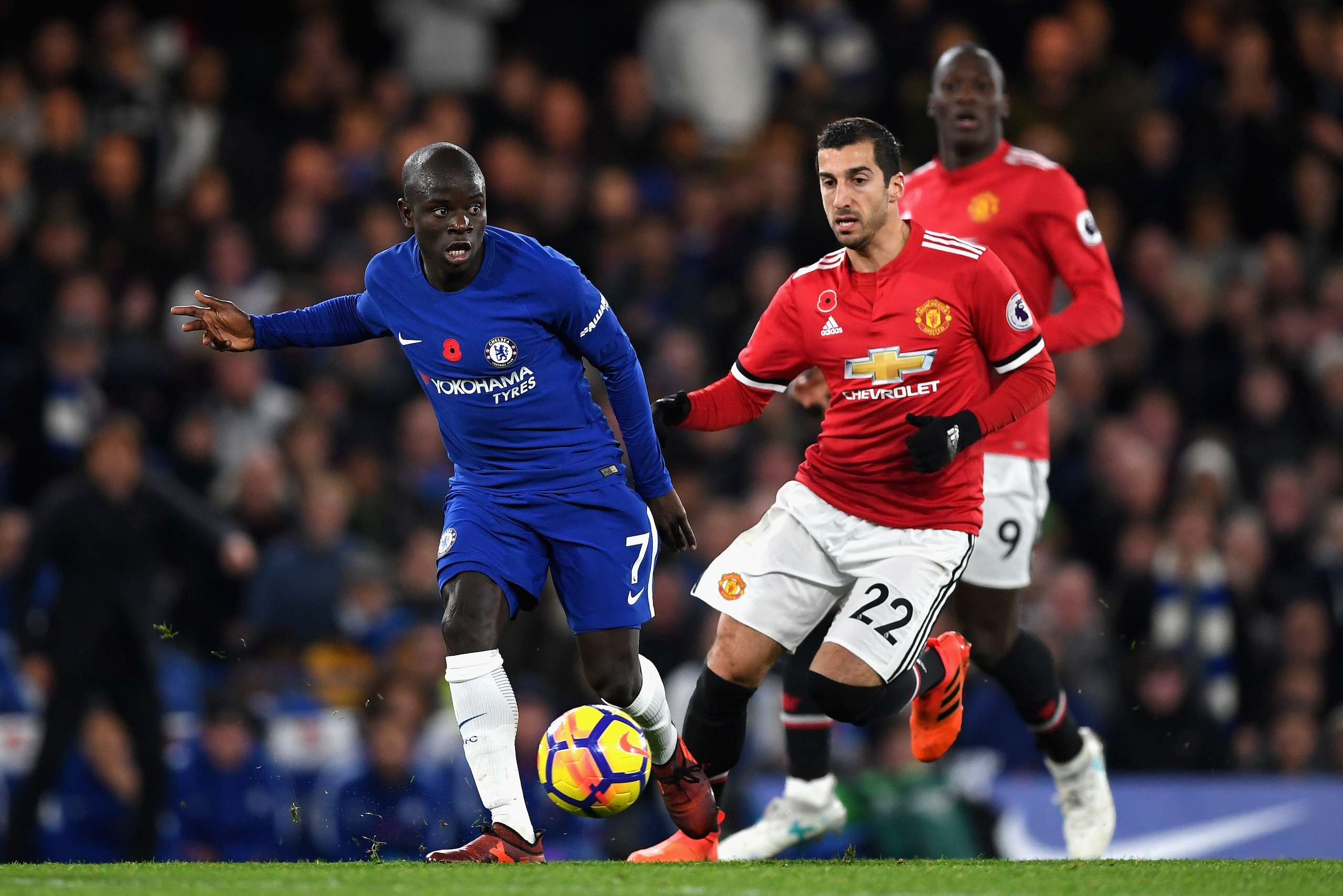 LONDON, ENGLAND - NOVEMBER 05: N'Golo Kante of Chelsea and Henrikh Mkhitaryan of Manchester United battle for possession during the Premier League match between Chelsea and Manchester United at Stamford Bridge on November 5, 2017 in London, England.  (Pho