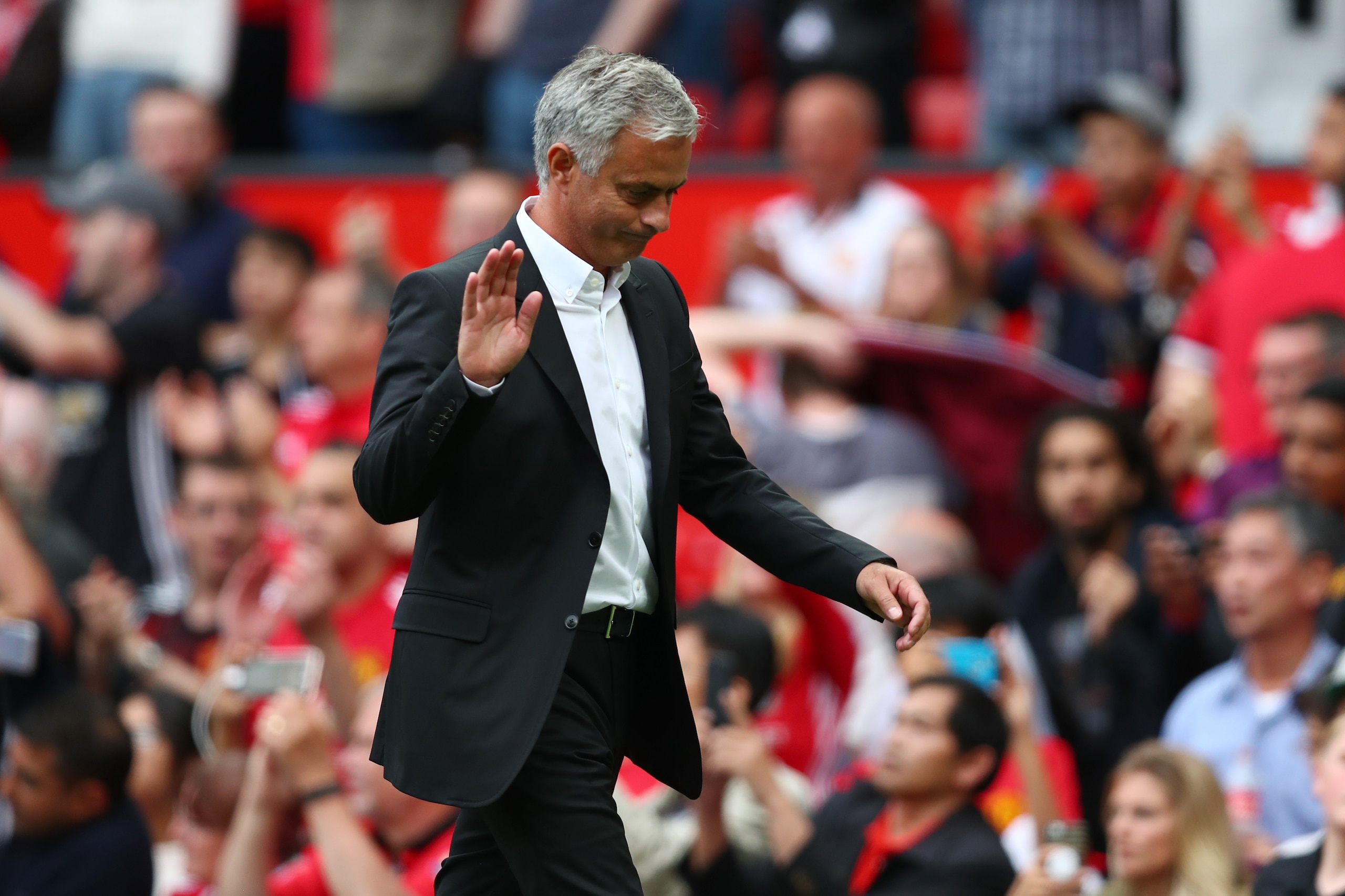 MANCHESTER, ENGLAND - AUGUST 13:  Jose Mourinho, Manager of Manchester United shows appreciation to the fans after the Premier League match between Manchester United and West Ham United at Old Trafford on August 13, 2017 in Manchester, England.  (Photo by
