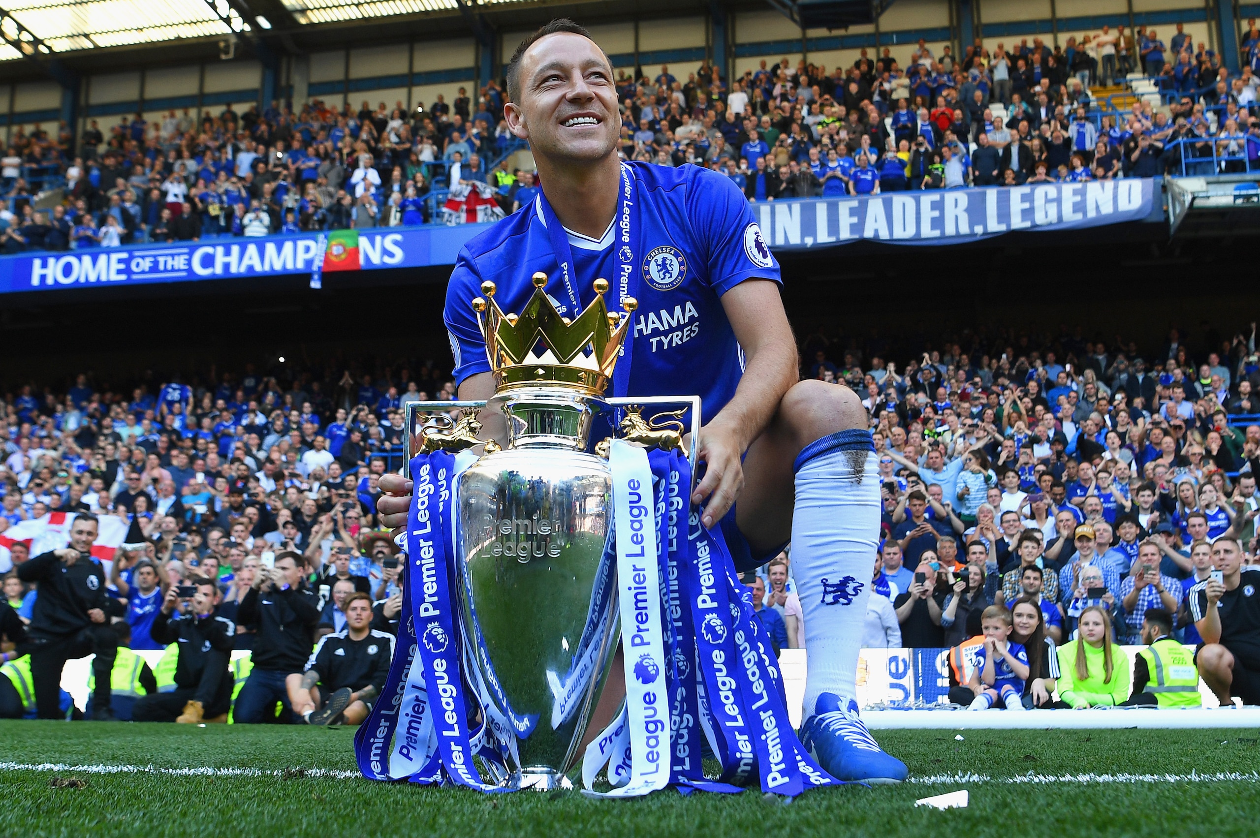 LONDON, ENGLAND - MAY 21:  John Terry of Chelsea poses with the Premier League Trophy after the Premier League match between Chelsea and Sunderland at Stamford Bridge on May 21, 2017 in London, England.  (Photo by Michael Regan/Getty Images)