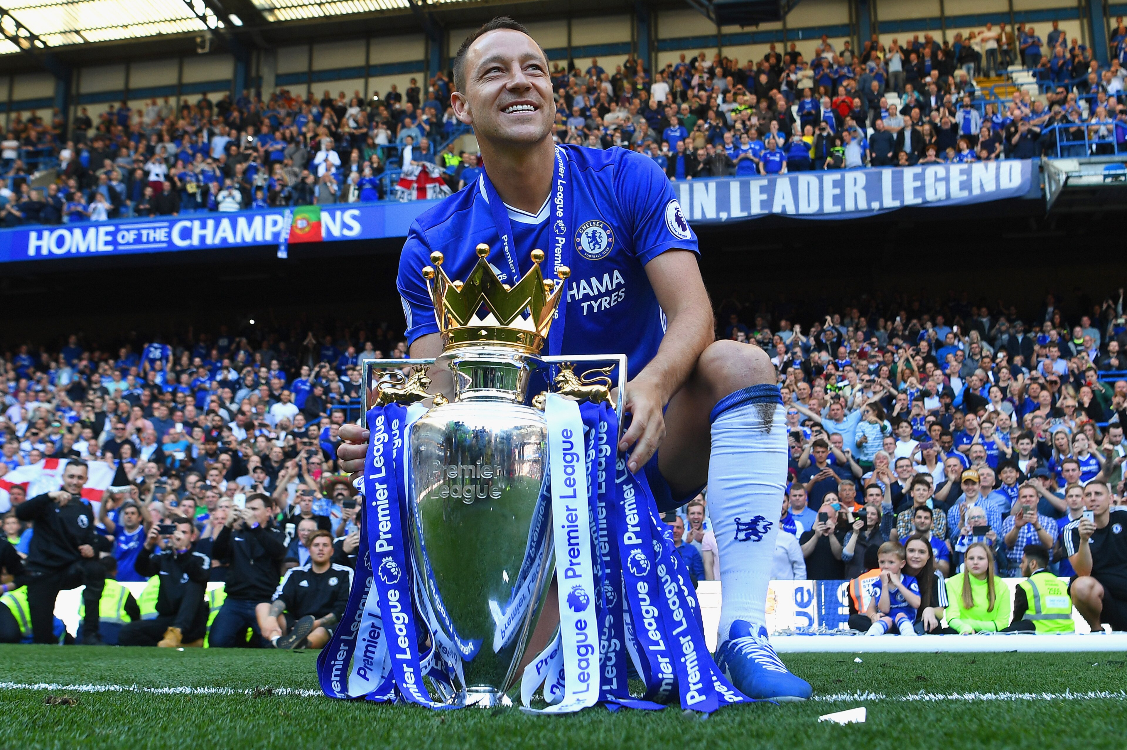 LONDON, ENGLAND - MAY 21:  John Terry of Chelsea poses with the Premier League Trophy after the Premier League match between Chelsea and Sunderland at Stamford Bridge on May 21, 2017 in London, England.  (Photo by Michael Regan/Getty Images)