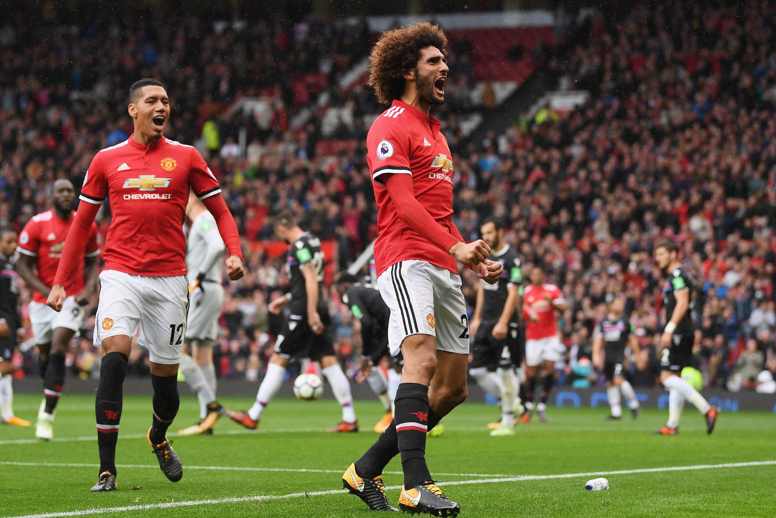 MANCHESTER, ENGLAND - SEPTEMBER 30:  Marouane Fellaini of Manchester United celebrates scroing his side's third goal during the Premier League match between Manchester United and Crystal Palace at Old Trafford on September 30, 2017 in Manchester, England.
