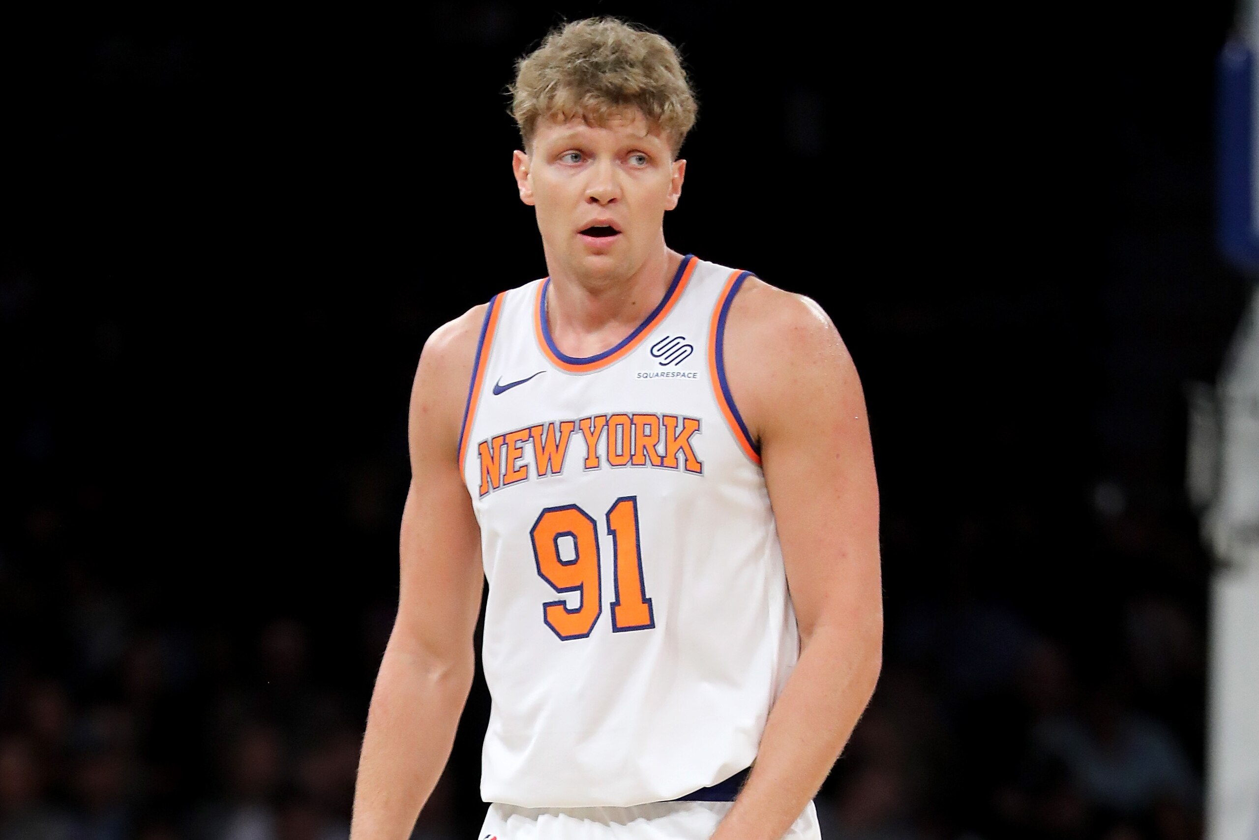 NEW YORK, NY - OCTOBER 13: Mindaugas Kuzminskas #91 of the New York Knicks reacts in the second half against the Washington Wizards during their Pre Season game at Madison Square Garden on October 13, 2017 in New York City. User expressly acknowledges and