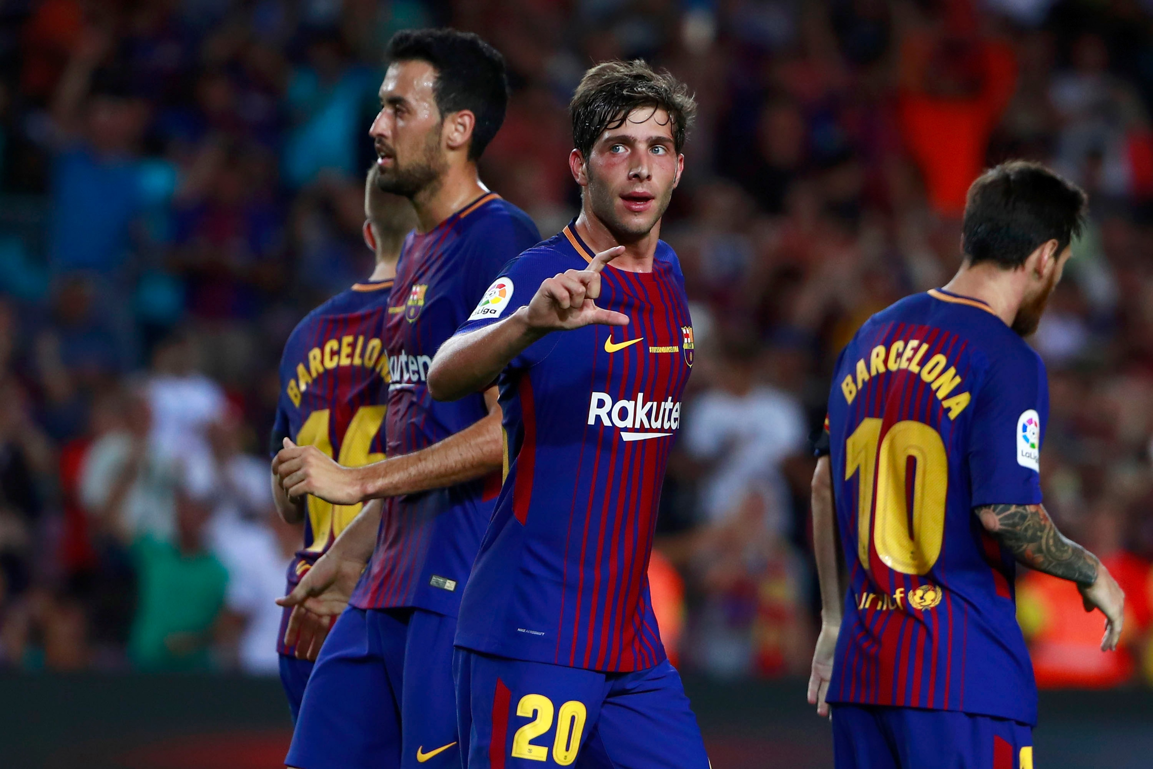 BARCELONA, SPAIN - AUGUST 20:  Sergi Roberto (L) of FC Barcelona celebrates scoring their second goal with teammates during the La Liga match between FC Barcelona and Real Betis Balompie at Camp Nou stadium on August 20, 2017 in Barcelona, Spain.  (Photo 