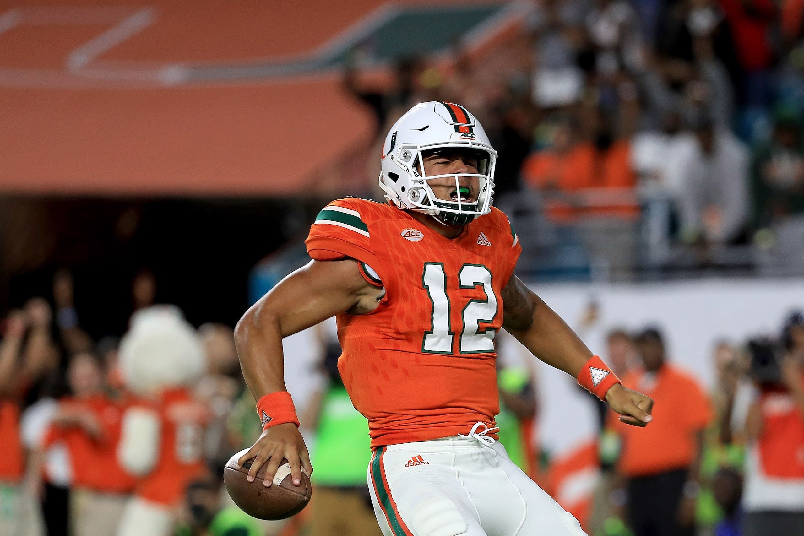 MIAMI GARDENS, FL - NOVEMBER 11:  Malik Rosier #12 of the Miami Hurricanes scores a touchdown during a game against the Notre Dame Fighting Irish at Hard Rock Stadium on November 11, 2017 in Miami Gardens, Florida.  (Photo by Mike Ehrmann/Getty Images)