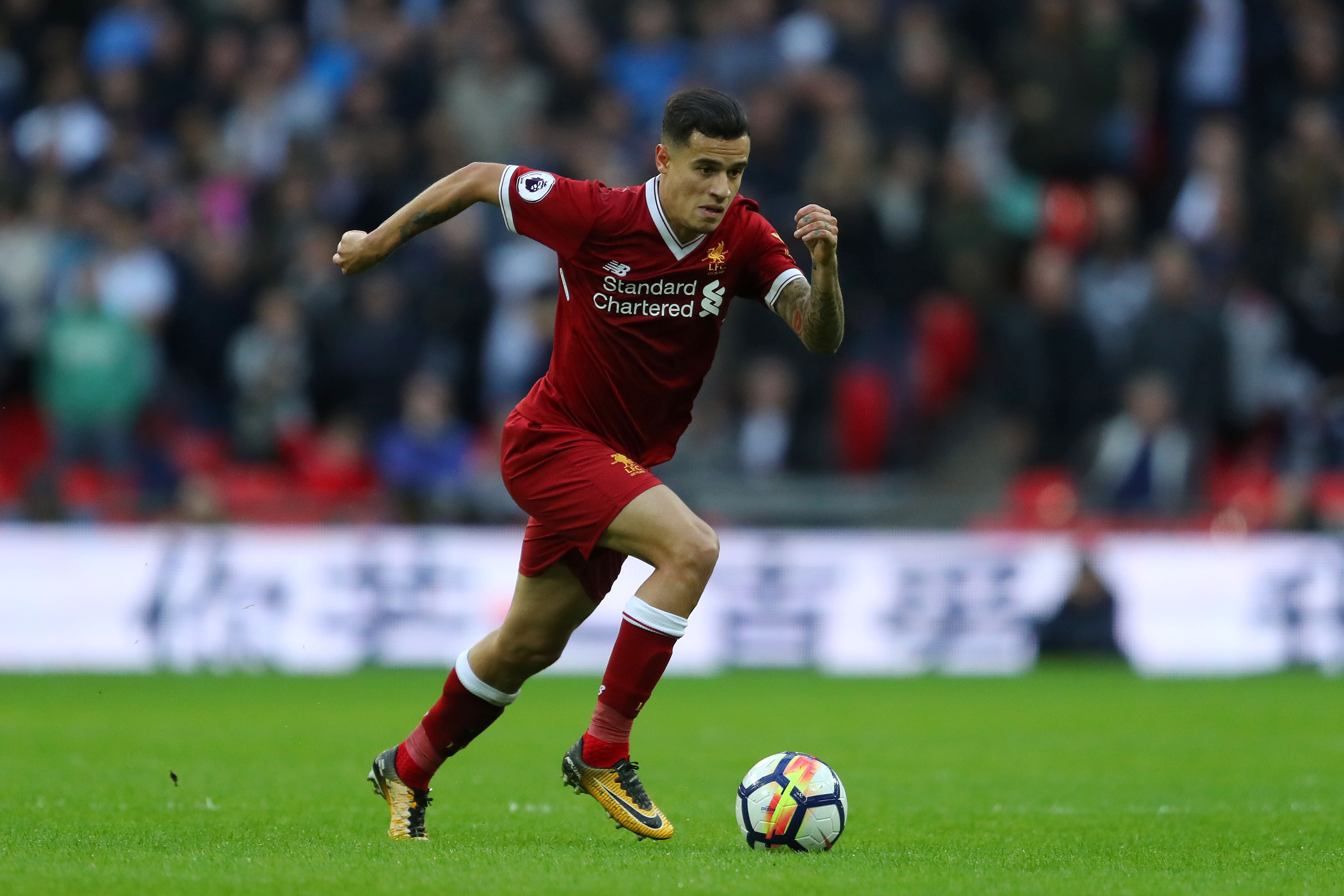 LONDON, ENGLAND - OCTOBER 22: Philippe Coutinho of Liverpool in action during the Premier League match between Tottenham Hotspur and Liverpool at Wembley Stadium on October 22, 2017 in London, England. (Photo by Richard Heathcote/Getty Images)