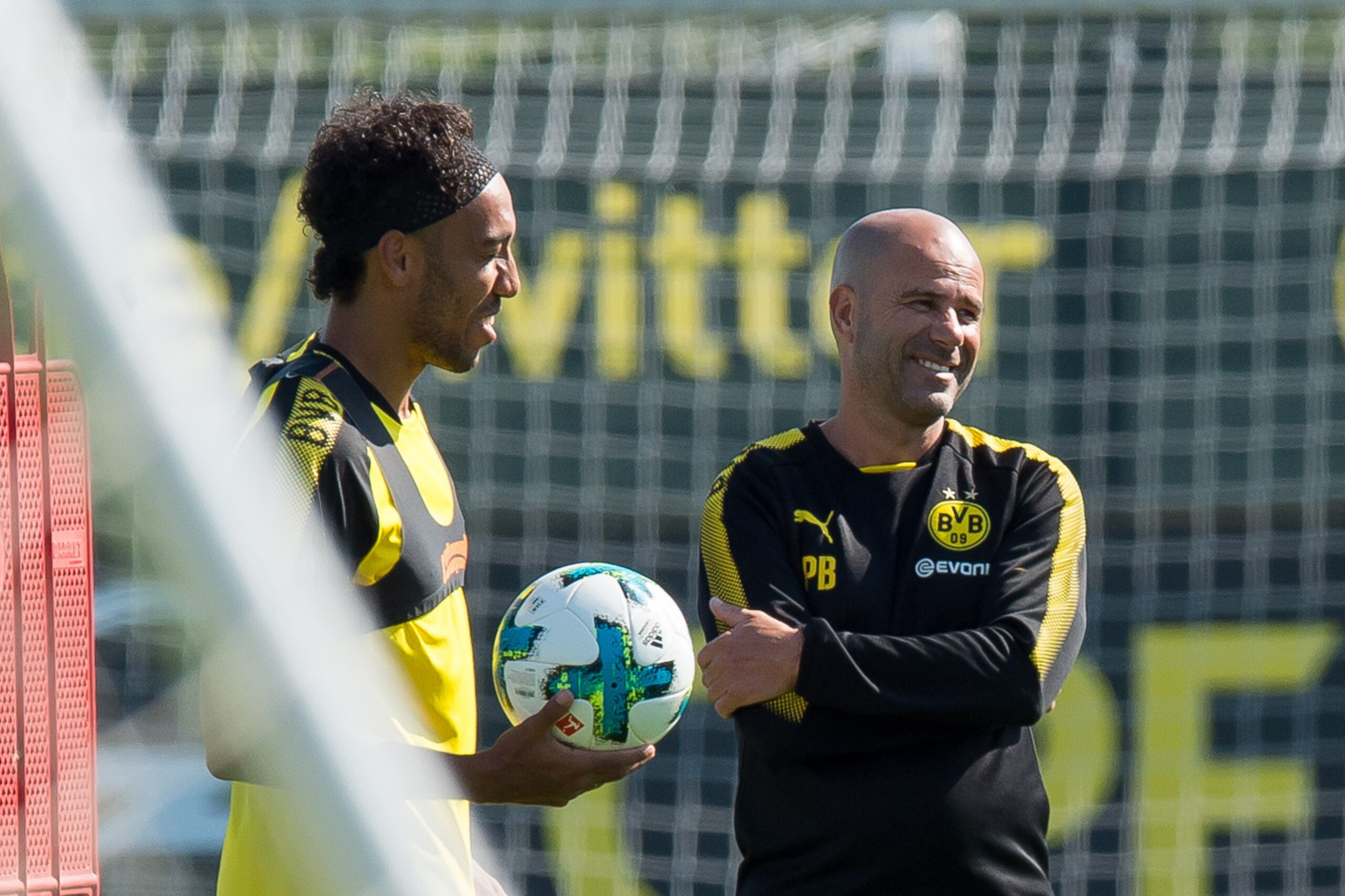 DORTMUND, GERMANY - SEPTEMBER 04: Pierre-Emerick Aubameyang of Dortmund and Head coach Peter Bosz of Dortmund laughs during a training session at the BVB Training center on September 4, 2017 in Dortmund, Germany. (Photo by TF-Images/TF-Images via Getty Im