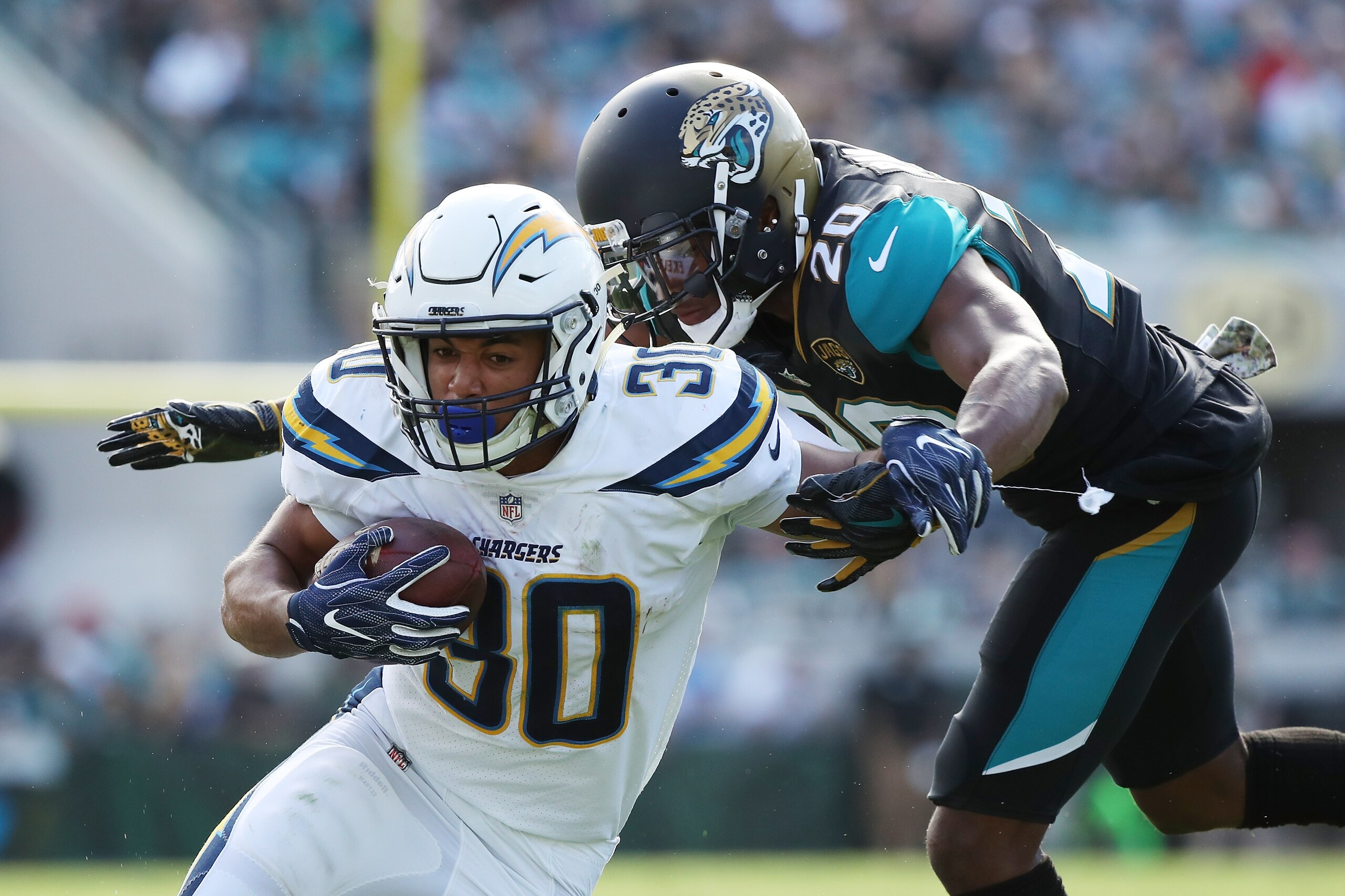 JACKSONVILLE, FL - NOVEMBER 12:  Austin Ekeler #30 of the Los Angeles Chargers beats Jalen Ramsey #20 of the Jacksonville Jaguars for a 28-yard touchdown in the first half of their game at EverBank Field on November 12, 2017 in Jacksonville, Florida.  (Ph