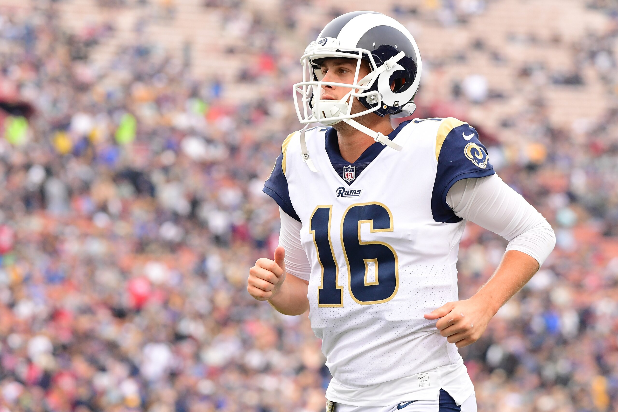LOS ANGELES, CA - NOVEMBER 12:  Jared Goff #16 of the Los Angeles Rams runs on the field during the game against the Houston Texans at the Los Angeles Memorial Coliseum on November 12, 2017 in Los Angeles, California.  (Photo by Harry How/Getty Images)
