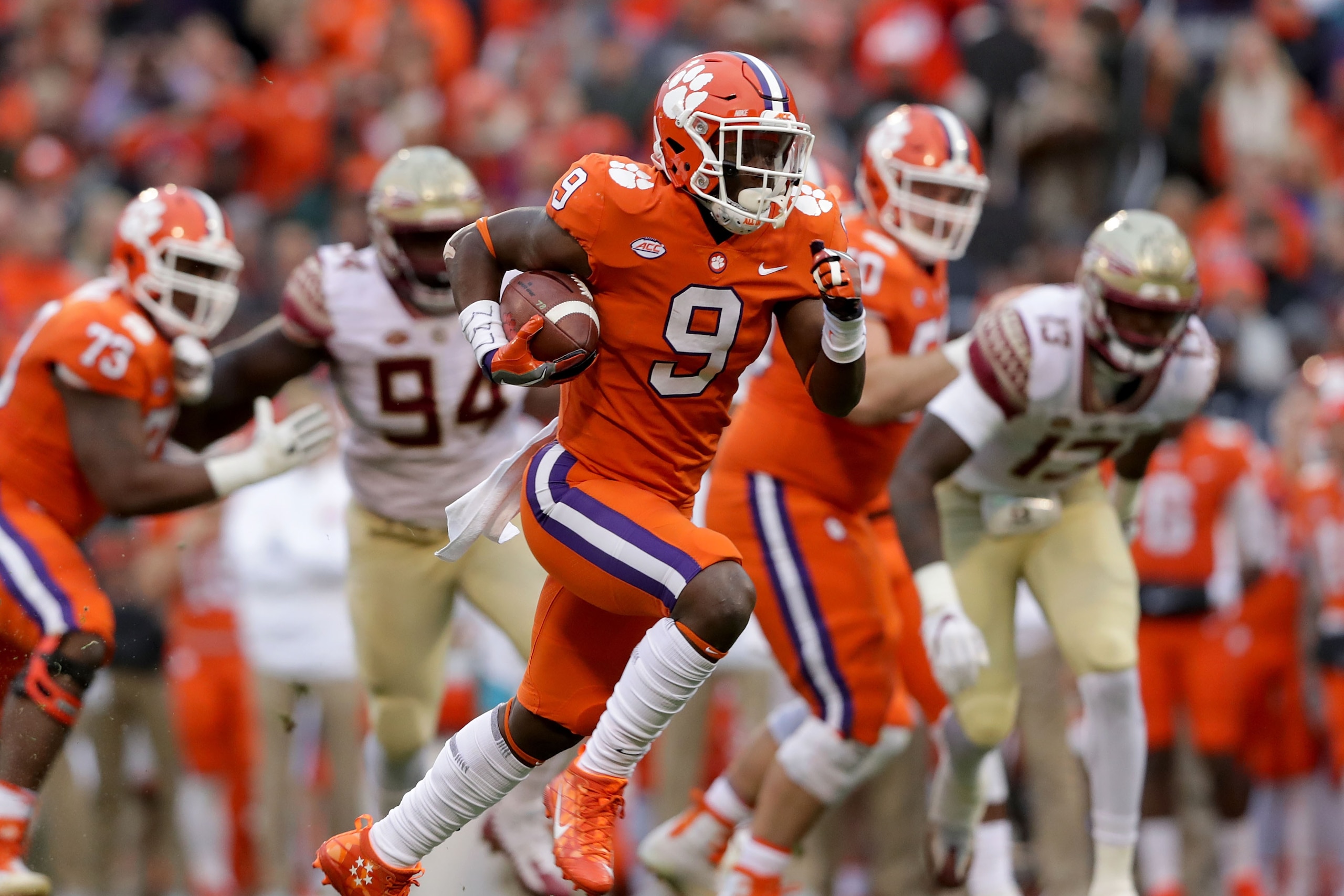 CLEMSON, SC - NOVEMBER 11:  Travis Etienne #9 of the Clemson Tigers runs for a touchdown against the Florida State Seminoles during their game at Memorial Stadium on November 11, 2017 in Clemson, South Carolina.  (Photo by Streeter Lecka/Getty Images)