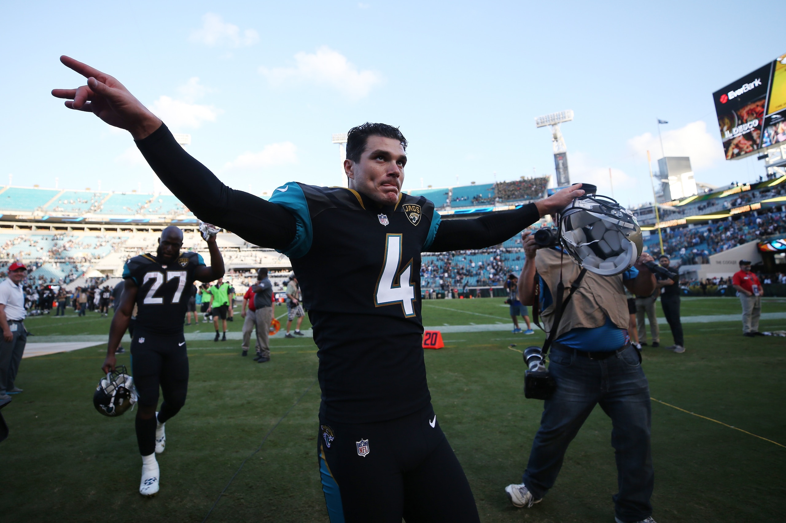 JACKSONVILLE, FL - NOVEMBER 12:  Josh Lambo #4 of the Jacksonville Jaguars celebrates after he made a 30-yard field goal in overtime as the Jacksonville Jaguars defeated the Los Angeles Chargers 20-17 at EverBank Field on November 12, 2017 in Jacksonville
