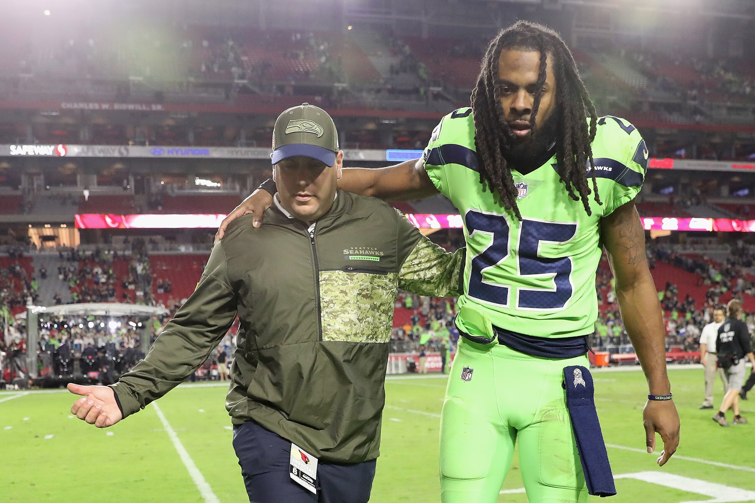 GLENDALE, AZ - NOVEMBER 09:  Cornerback Richard Sherman #25 of the Seattle Seahawks is helped off the field following the NFL game against the Arizona Cardinals at the University of Phoenix Stadium on November 9, 2017 in Glendale, Arizona.  The Seahawks d