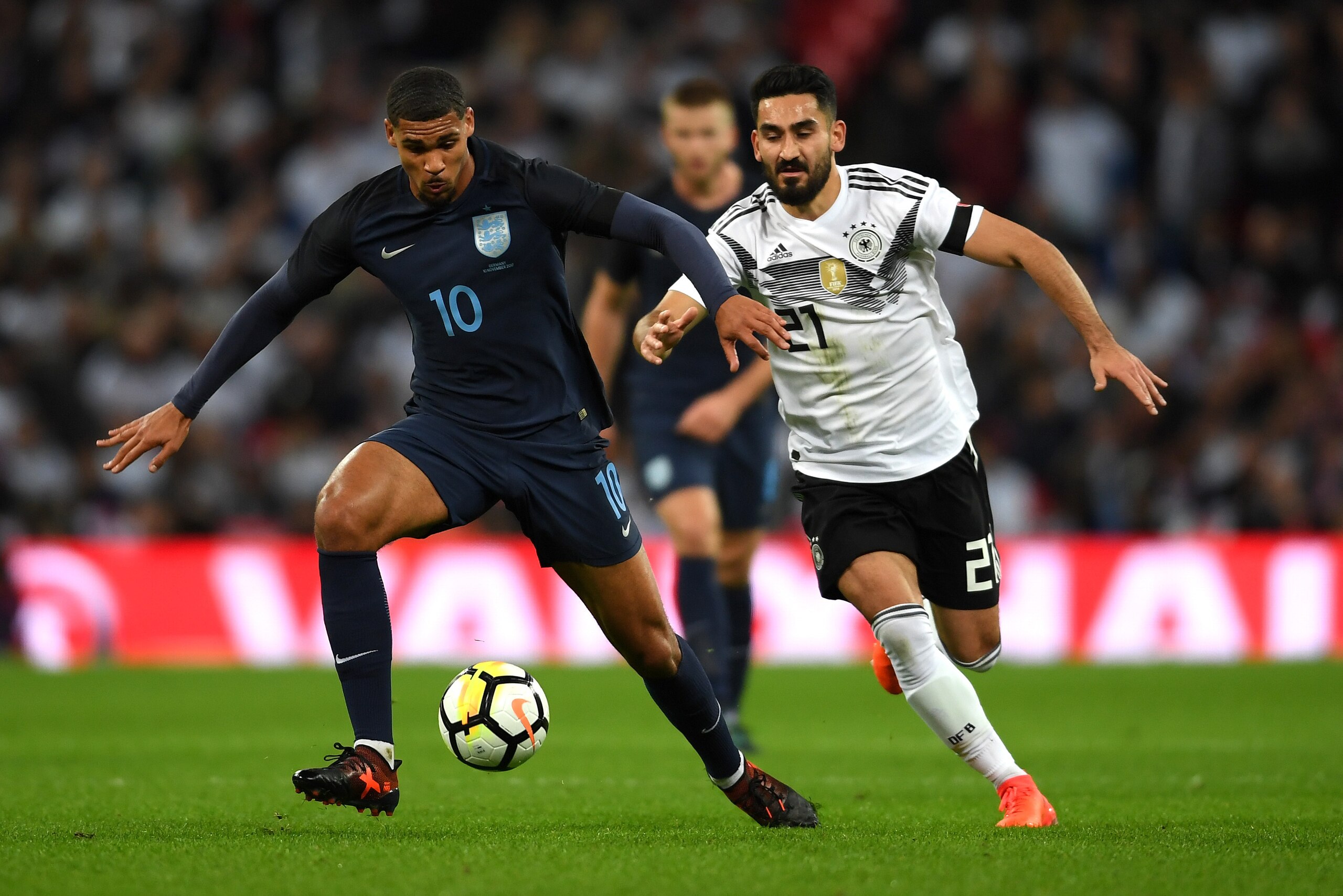 LONDON, ENGLAND - NOVEMBER 10: Ruben Loftus-Cheek of England and IIkay Gundogan of Germany battle for possession during the International friendly match between England and Germany at Wembley Stadium on November 10, 2017 in London, England.  (Photo by Ros