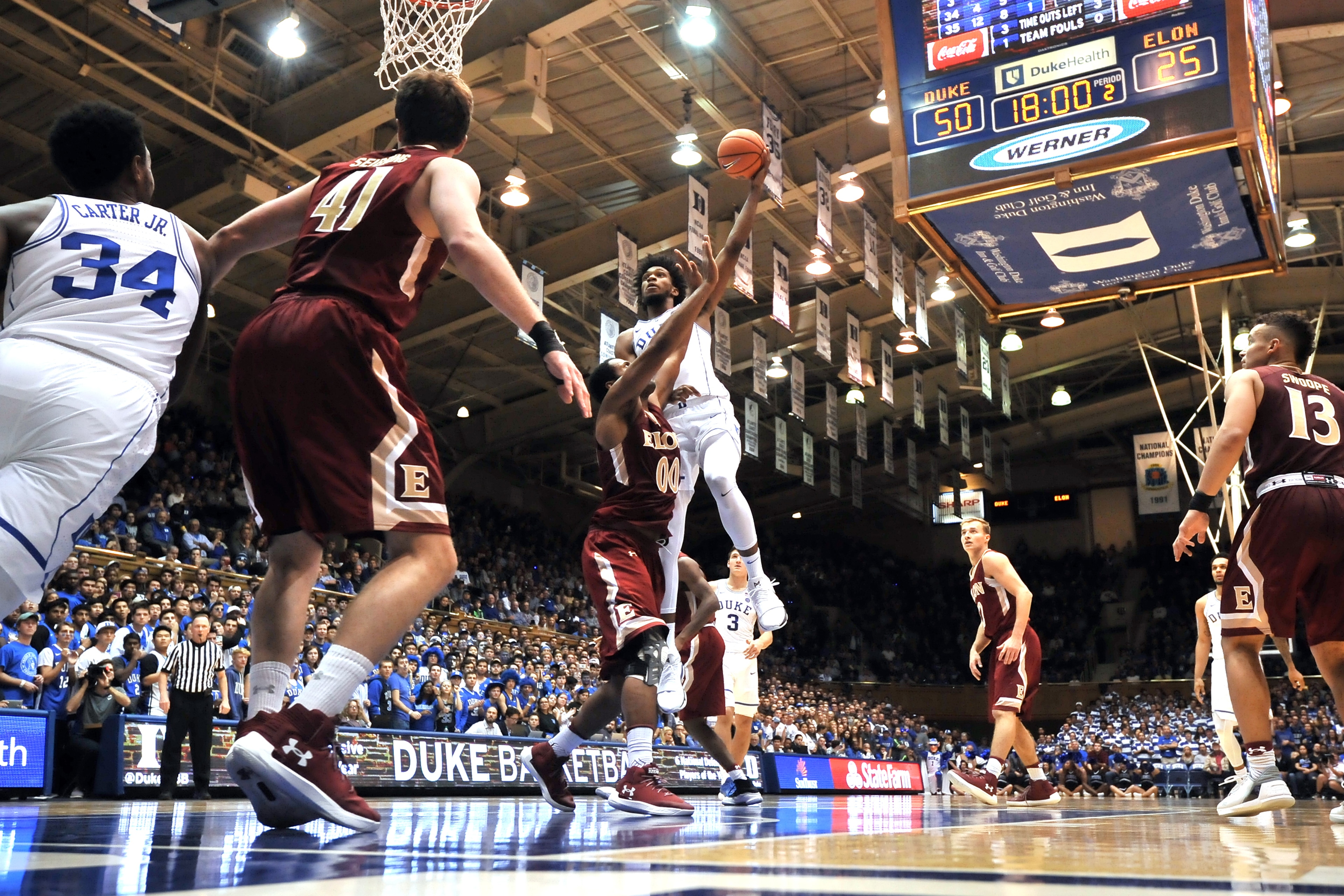 DURHAM, NC - NOVEMBER 10: Marvin Bagley III #35 of the Duke Blue Devils puts up a shot against Brian Dawkins #0 of the Elon Phoenix at Cameron Indoor Stadium on November 10, 2017 in Durham, North Carolina. Duke won 97-68. (Photo by Lance King/Getty Images