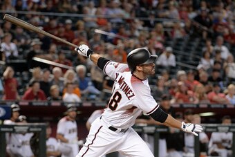 PHOENIX, AZ - SEPTEMBER 27:  J.D. Martinez #28 of the Arizona Diamondbacks hits a solo home run in the ninth inning of the MLB game against the San Francisco Giants at Chase Field on September 27, 2017 in Phoenix, Arizona.  (Photo by Jennifer Stewart/Gett