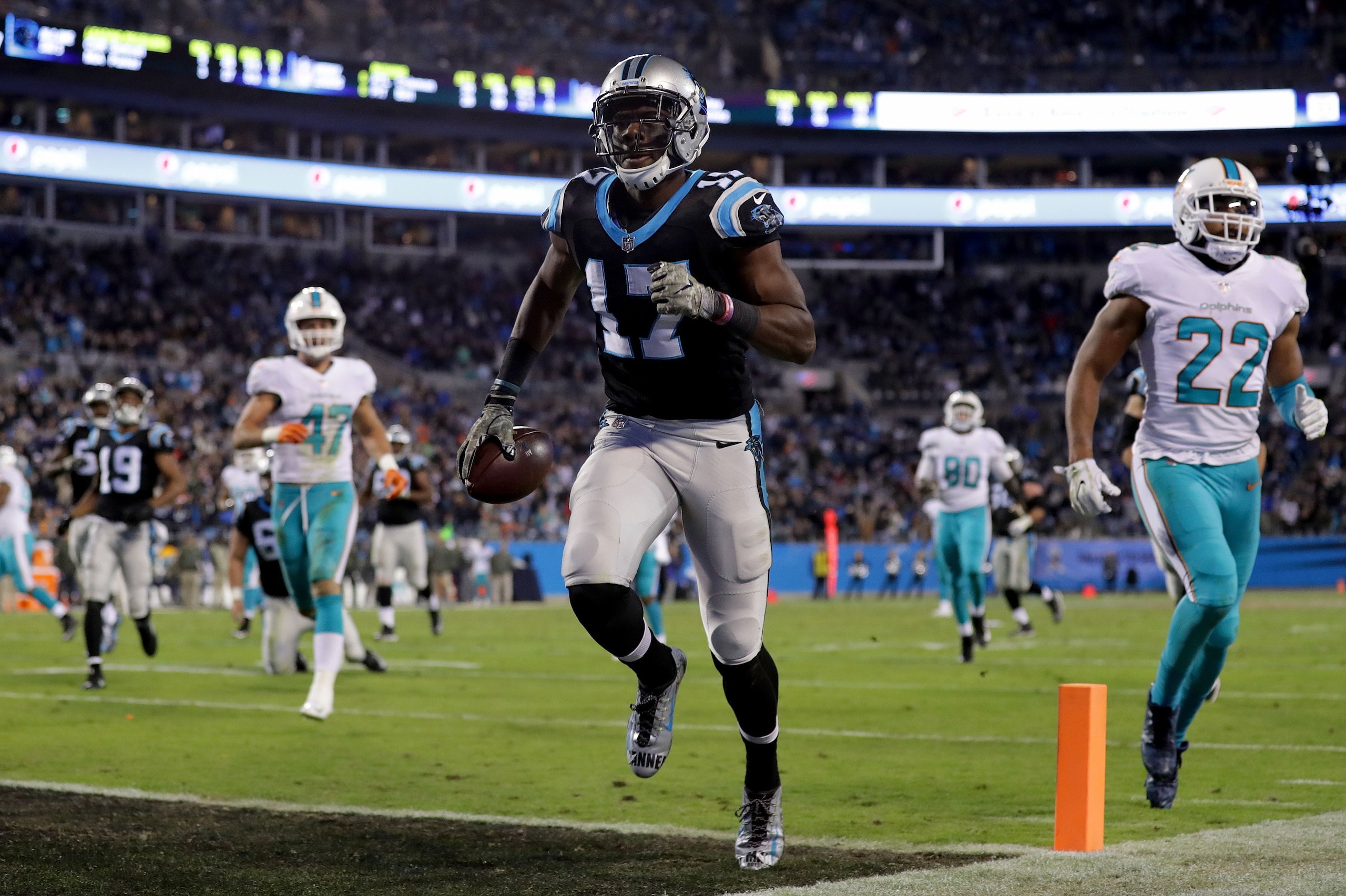 CHARLOTTE, NC - NOVEMBER 13:  Devin Funchess #17 of the Carolina Panthers scores a touchdown against the Miami Dolphins in the third quarter during their game at Bank of America Stadium on November 13, 2017 in Charlotte, North Carolina.  (Photo by Streete