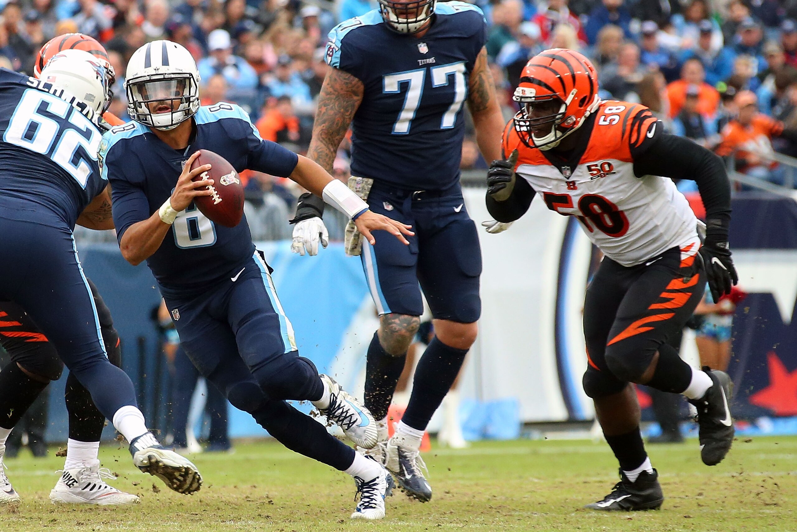 NASHVILLE, TN - NOVEMBER 12:  Quarterback Marcus Mariota #8 of the Tennessee Titans plays against the Cincinnatti Bengals at Nissan Stadium on November 12, 2017 in Nashville, Tennessee.  (Photo by Frederick Breedon/Getty Images)