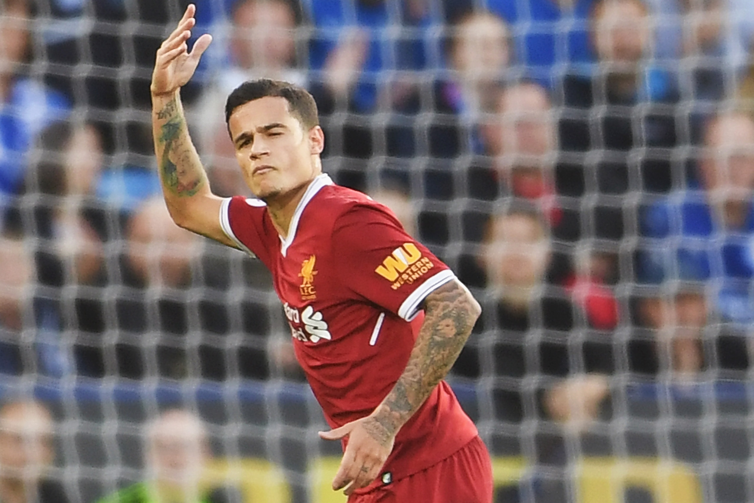 LEICESTER, ENGLAND - SEPTEMBER 23:  Philippe Coutinho of Liverpool celebrates after scoring his sides second goal during the Premier League match between Leicester City and Liverpool at The King Power Stadium on September 23, 2017 in Leicester, England.  