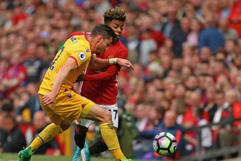 MANCHESTER, ENGLAND - MAY 21:  Angel Gomes of Manchester United and Joel Ward of Crystal Palace in action during the Premier League match between Manchester United and Crystal Palace at Old Trafford on May 21, 2017 in Manchester, England.  (Photo by Dave 