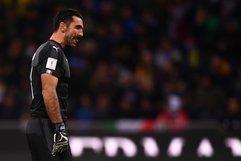 Italy's goalkeeper Gianluigi Buffon reacts during the FIFA World Cup 2018 qualification football match between Italy and Sweden, on November 13, 2017 at the San Siro stadium in Milan. / AFP PHOTO / MARCO BERTORELLO        (Photo credit should read MARCO B