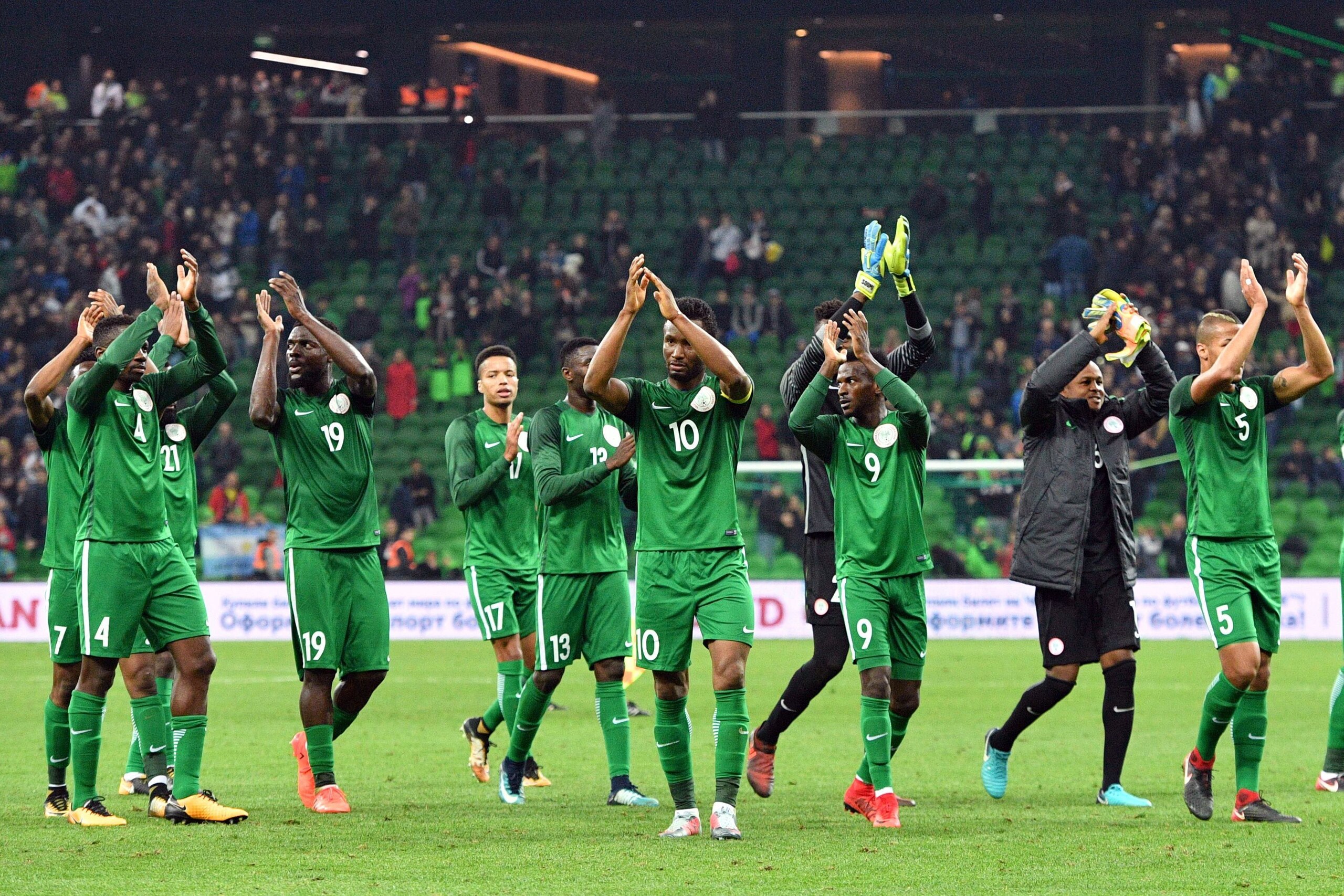 Nigeria's players celebrate after an international friendly football match between Argentina and Nigeria in Krasnodar on November 14, 2017. / AFP PHOTO / Mladen ANTONOV        (Photo credit should read MLADEN ANTONOV/AFP/Getty Images)