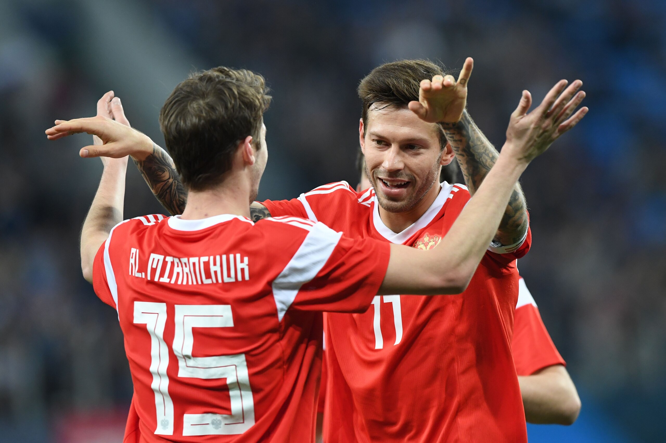 Russia's Aleksey Miranchuk (15) celebrates with Fedor Smolov after scoring a goal during an international friendly football match between Russia and Spain at the Saint Petersburg Stadium in Saint Petersburg on November 14, 2017. / AFP PHOTO / Kirill KUDRY Russia's Aleksey Miranchuk (15) celebrates with Fedor Smolov after scoring a goal during an international friendly football match between Russia and Spain at the Saint Petersburg Stadium in Saint Petersburg on November 14, 2017. / AFP PHOTO / Kirill KUDRY