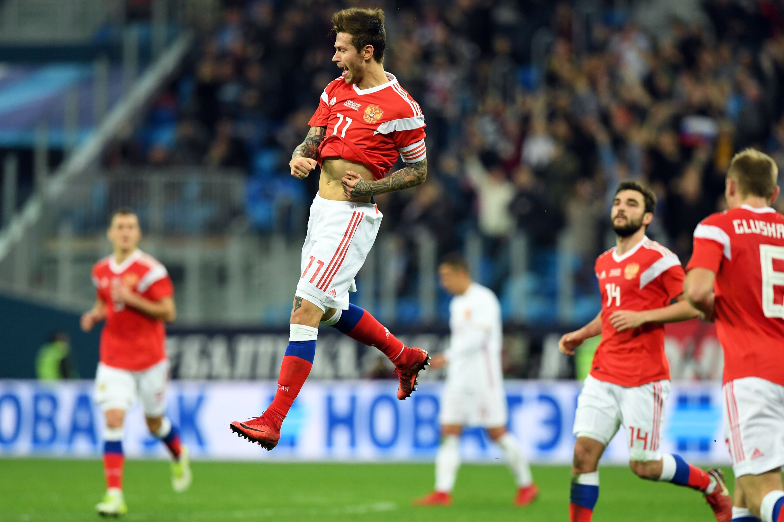Russia's Fedor Smolov celebrates after scoring the team's third goal during an international friendly football match between Russia and Spain at the Saint Petersburg Stadium in Saint Petersburg on November 14, 2017. / AFP PHOTO / Kirill KUDRYAVTSEV Russia's Fedor Smolov celebrates after scoring the team's third goal during an international friendly football match between Russia and Spain at the Saint Petersburg Stadium in Saint Petersburg on November 14, 2017. / AFP PHOTO / Kirill KUDRYAVTSEV