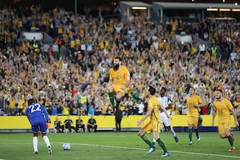 SYDNEY, AUSTRALIA - NOVEMBER 15:  Mile Jedinak of Australia celebrates scoring a goal during the 2018 FIFA World Cup Qualifiers Leg 2 match between the Australian Socceroos and Honduras at ANZ Stadium on November 15, 2017 in Sydney, Australia.  (Photo by 