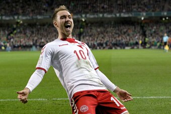 Denmark's midfielder Christian Eriksen celebrates after scoring their third goal during the FIFA World Cup 2018 qualifying football match, second leg, between Republic of Ireland and Denmark at Aviva Stadium in Dublin on November 14, 2017. / AFP PHOTO / P