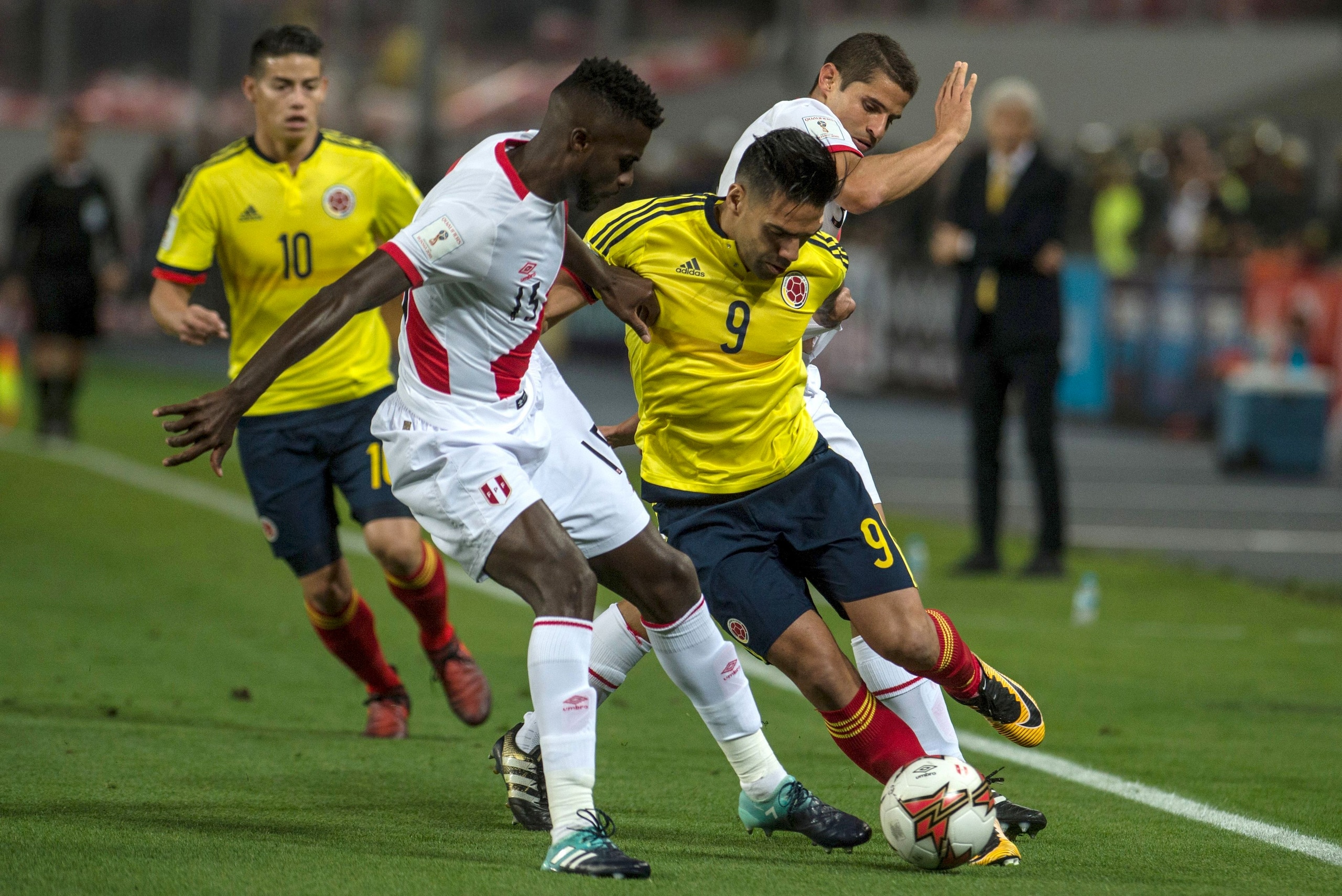 Colombia's Radamel Falcao (R) fights for the ball with Peru's Christian Ramos during their 2018 World Cup qualifier football match in Lima, on October 10, 2017. / AFP PHOTO / Ernesto BENAVIDES (Photo credit should read ERNESTO BENAVIDES/AFP/Getty I Colombia's Radamel Falcao (R) fights for the ball with Peru's Christian Ramos during their 2018 World Cup qualifier football match in Lima, on October 10, 2017. / AFP PHOTO / Ernesto BENAVIDES (Photo credit should read ERNESTO BENAVIDES/AFP/Getty I