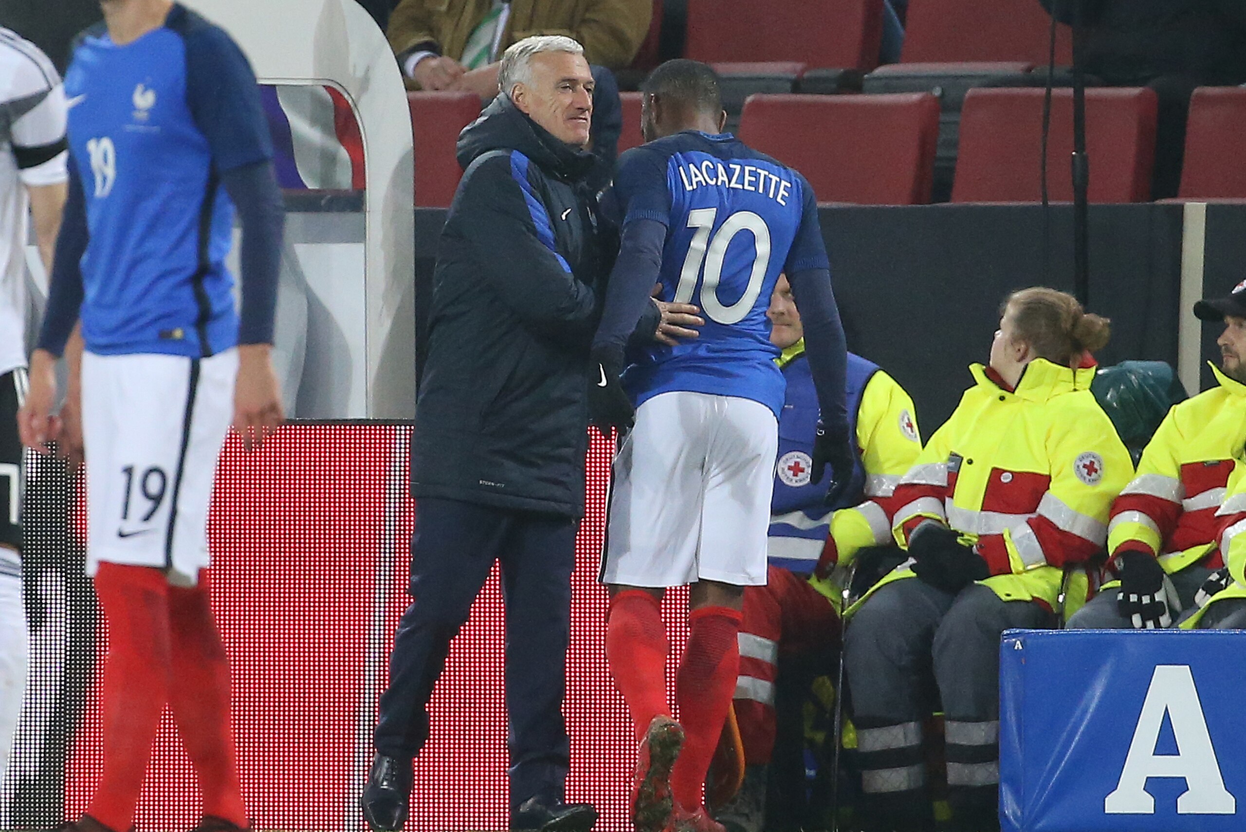 COLOGNE, GERMANY - NOVEMBER 14: Coach of France Didier Deschamps greets Alexandre Lacazette of France when he's replaced during the international friendly match between Germany and France at RheinEnergieStadion on November 14, 2017 in Cologne, Germany. (P COLOGNE, GERMANY - NOVEMBER 14: Coach of France Didier Deschamps greets Alexandre Lacazette of France when he's replaced during the international friendly match between Germany and France at RheinEnergieStadion on November 14, 2017 in Cologne, Germany. (P