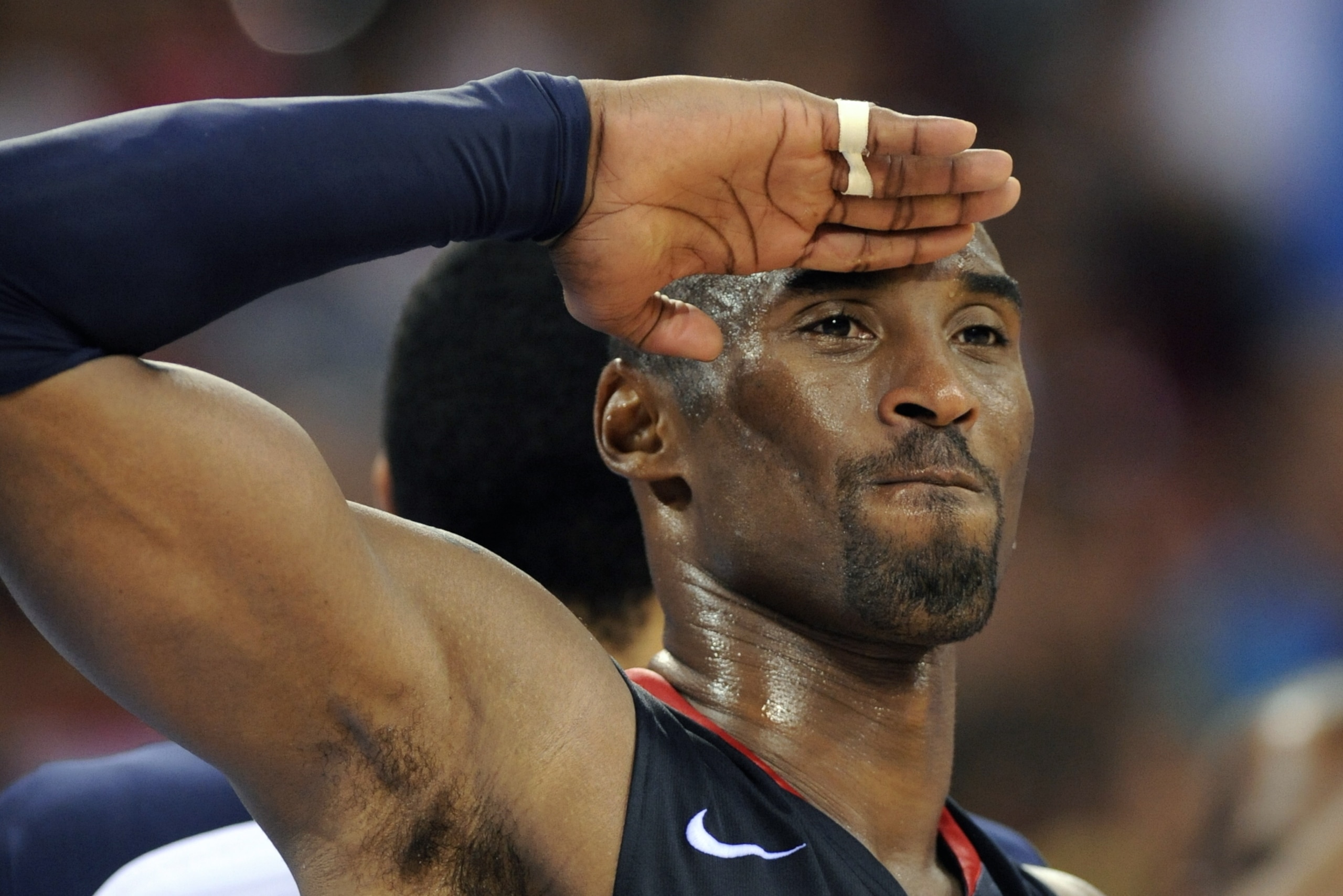 USA's Kobe Bryant celebrates at the end of the men's basketball gold medal match Spain against The US of the Beijing 2008 Olympic Games on August 24, 2008 at the Olympic basketball Arena in Beijing. The US won 118-107.   AFP PHOTO / TIMOTHY A. CLARY / AFP