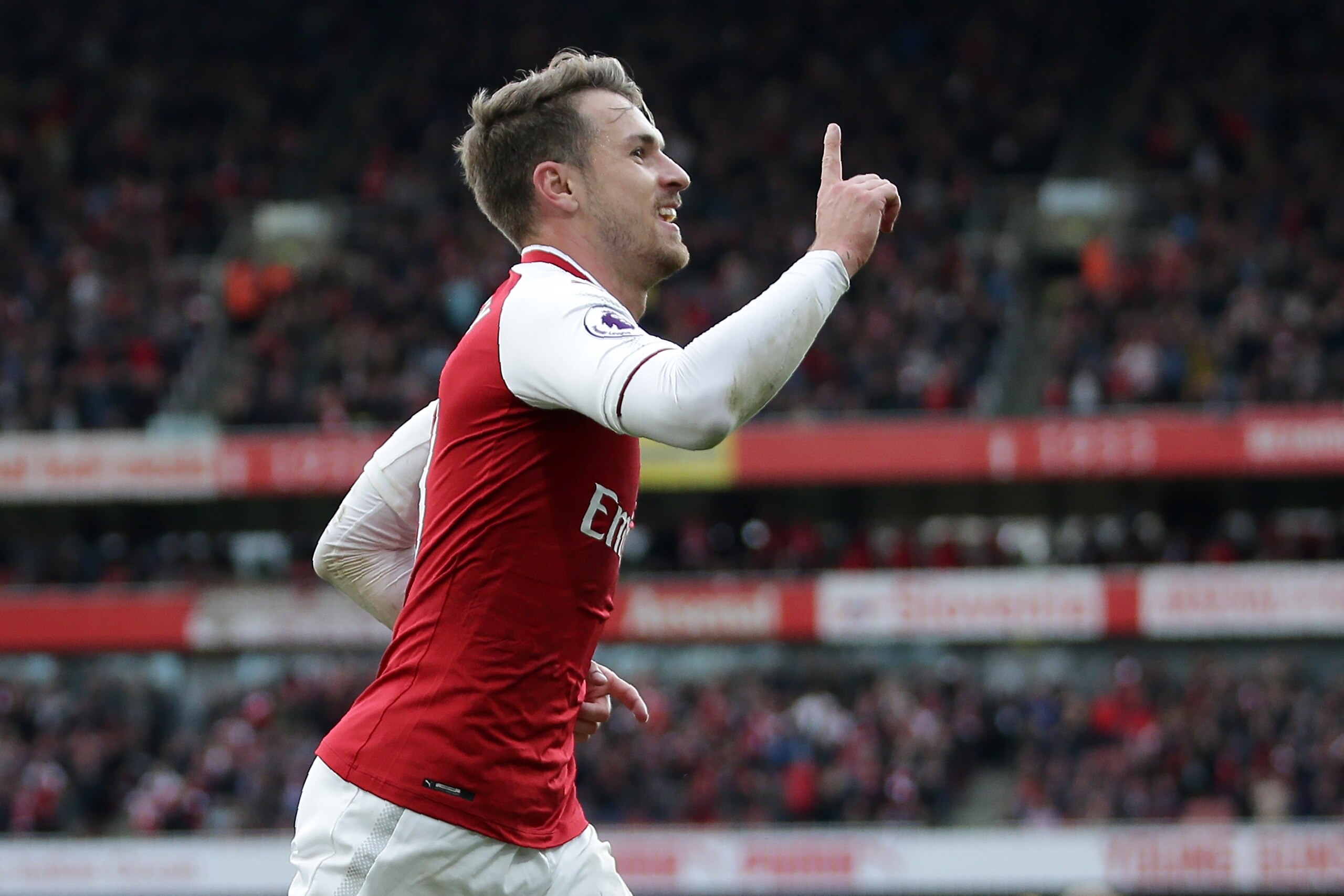 Arsenal's Welsh midfielder Aaron Ramsey celebrates after scoring their second goal during the English Premier League football match between Arsenal and Swansea City at the Emirates Stadium in London on October 28, 2017.  / AFP PHOTO / Daniel LEAL-OLIVAS /