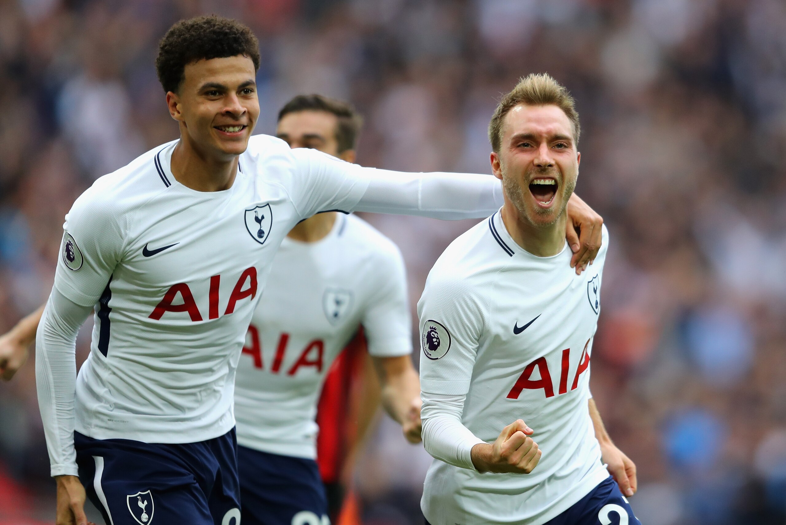 LONDON, ENGLAND - OCTOBER 14:  Christian Eriksen of Tottenham Hotspur celebrates scoring his sides first goal with Dele Alli of Tottenham Hotspur during the Premier League match between Tottenham Hotspur and AFC Bournemouth at Wembley Stadium on October 1