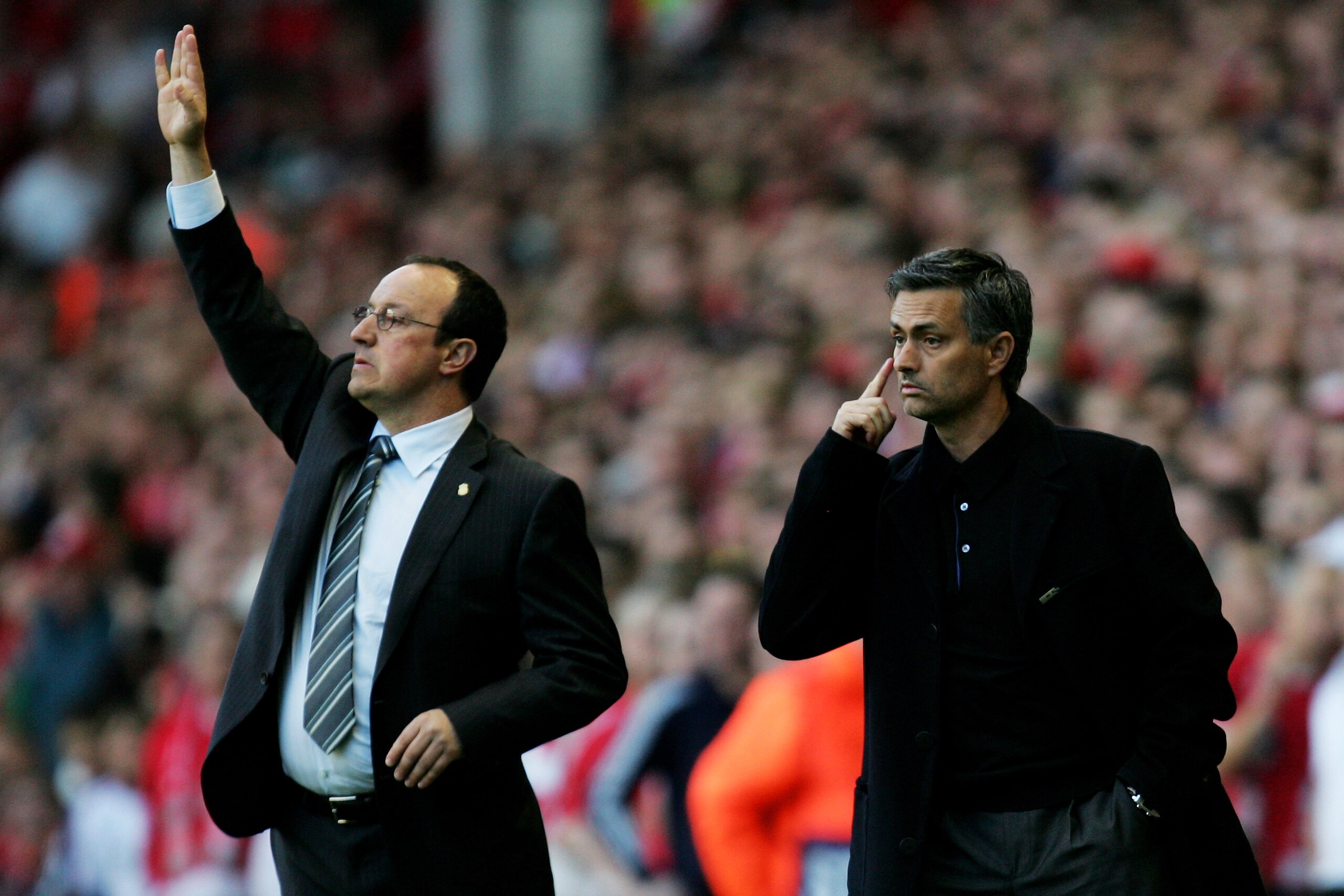 LIVERPOOL, UNITED KINGDOM - MAY 01:  Jose Mourinho (R) Manager of Chelsea and Rafael Benitez (L) Manager of Liverpool shout instructions from the side lines during the UEFA Champions League semi final second leg match between Liverpool and Chelsea at Anfi