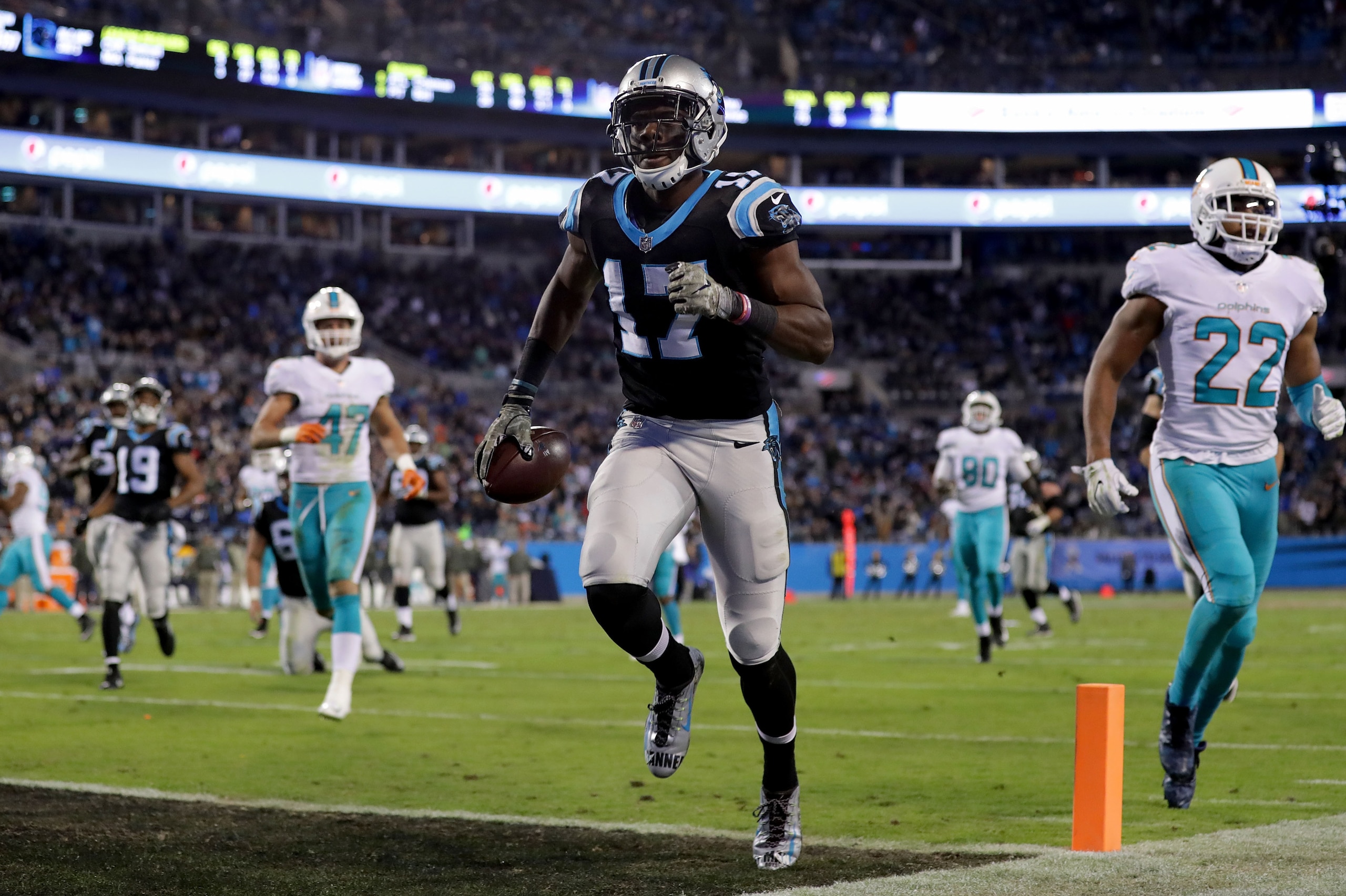 CHARLOTTE, NC - NOVEMBER 13:  Devin Funchess #17 of the Carolina Panthers scores a touchdown against the Miami Dolphins in the third quarter during their game at Bank of America Stadium on November 13, 2017 in Charlotte, North Carolina.  (Photo by Streete