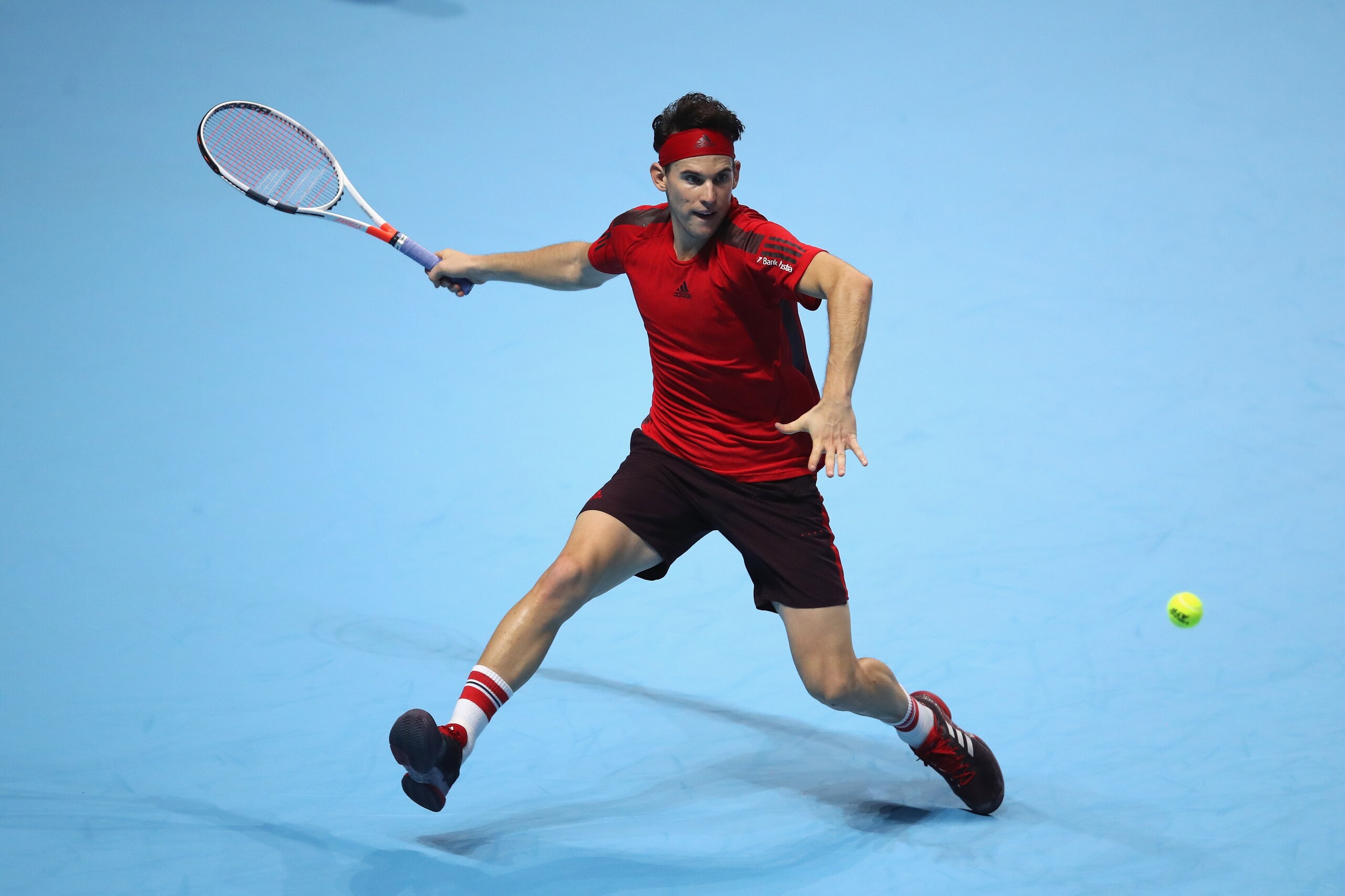 LONDON, ENGLAND - NOVEMBER 15:  Dominic Thiem of Austria plays a forehand  during the singles match against Pablo Carreno Busta of Spain on day four of the 2017 Nitto ATP World Tour Finals at O2 Arena on November 15, 2017 in London, England.  (Photo by Ju