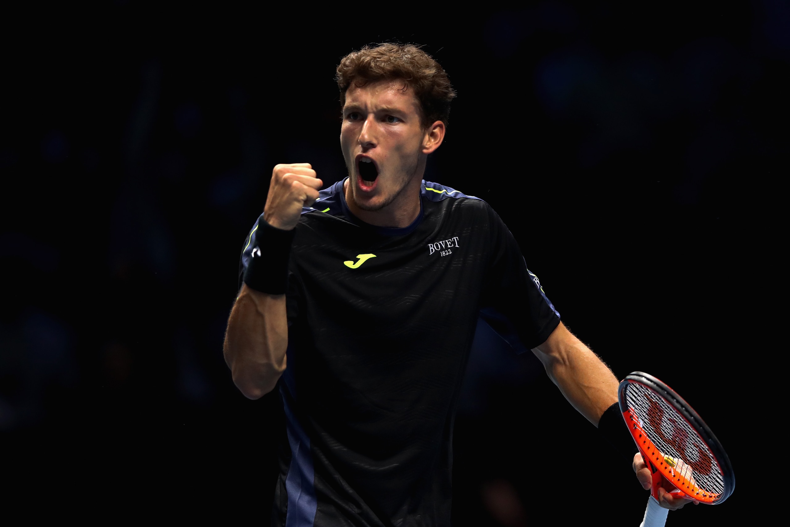 LONDON, ENGLAND - NOVEMBER 15:  Pablo Carreno Busta of Spain celebrates during the singles match against Dominic Thiem of Austria on day four of the 2017 Nitto ATP World Tour Finals at O2 Arena on November 15, 2017 in London, England.  (Photo by Clive Bru