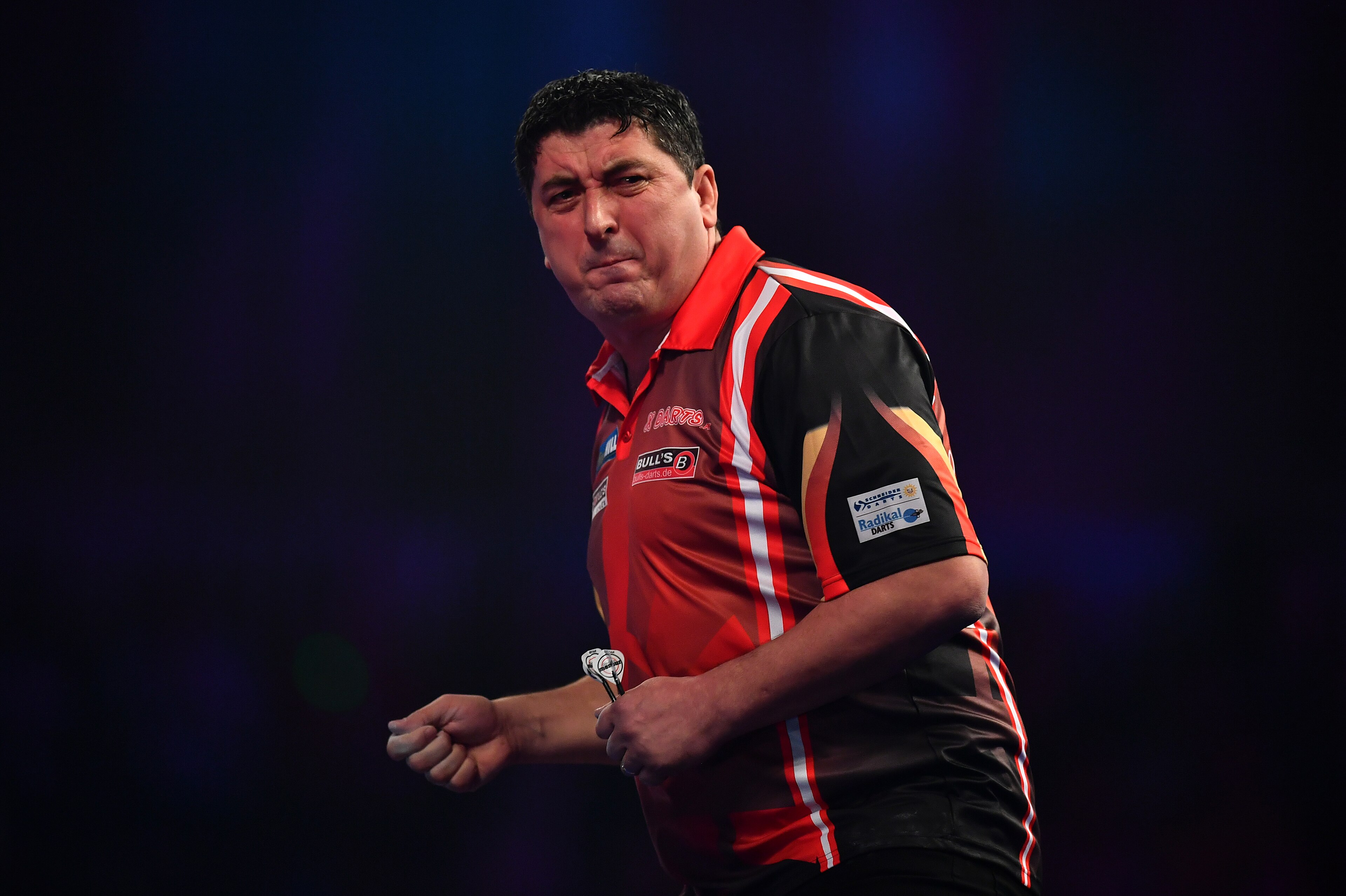 LONDON, ENGLAND - DECEMBER 21: Mensur Suljovic of Serbia reacts during his first round match against Ron Meulenkamp of the Netherlands on day seven of the 2017 William Hill PDC World Darts Championships at Alexandra Palace on December 21, 2016 in London, LONDON, ENGLAND - DECEMBER 21: Mensur Suljovic of Serbia reacts during his first round match against Ron Meulenkamp of the Netherlands on day seven of the 2017 William Hill PDC World Darts Championships at Alexandra Palace on December 21, 2016 in London,