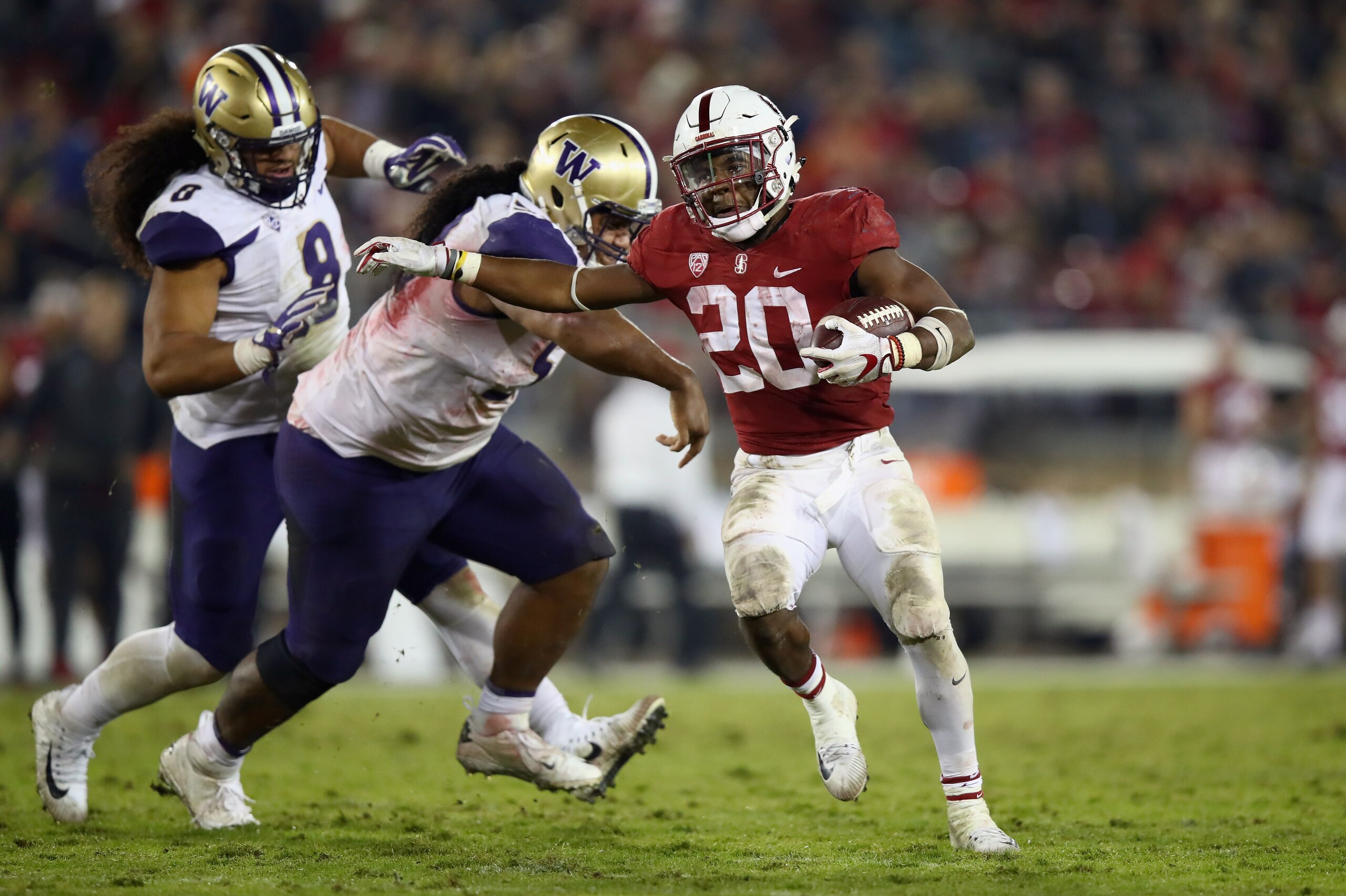 PALO ALTO, CA - NOVEMBER 10:  Bryce Love #20 of the Stanford Cardinal runs with the ball against the Washington Huskies at Stanford Stadium on November 10, 2017 in Palo Alto, California.  (Photo by Ezra Shaw/Getty Images)