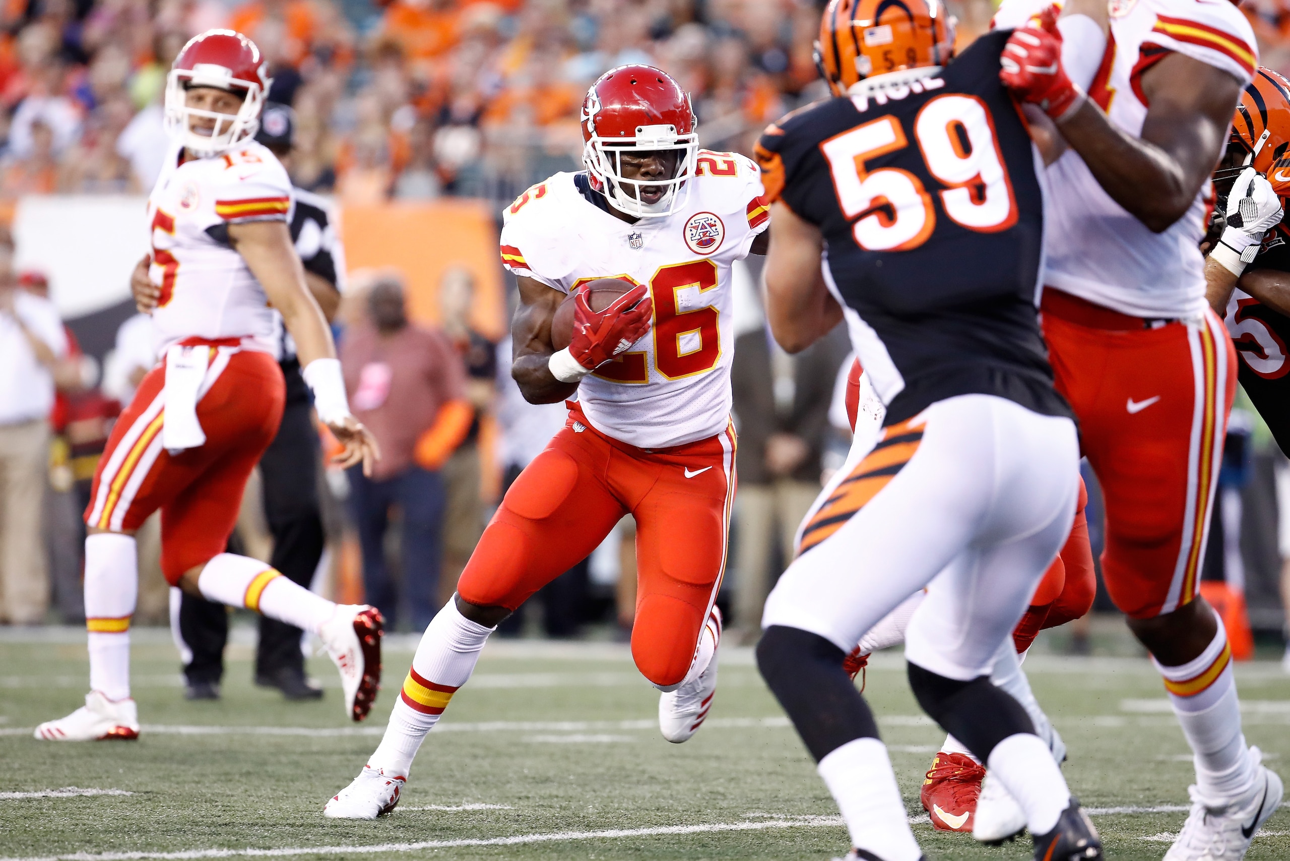 CINCINNATI, OH - AUGUST 19:  C.J. Spiller #26  of the Kansas City Chiefs runs with the ball against the Cincinnati Bengals during the preseason game at Paul Brown Stadium on August 19, 2017 in Cincinnati, Ohio.  (Photo by Andy Lyons/Getty Images)