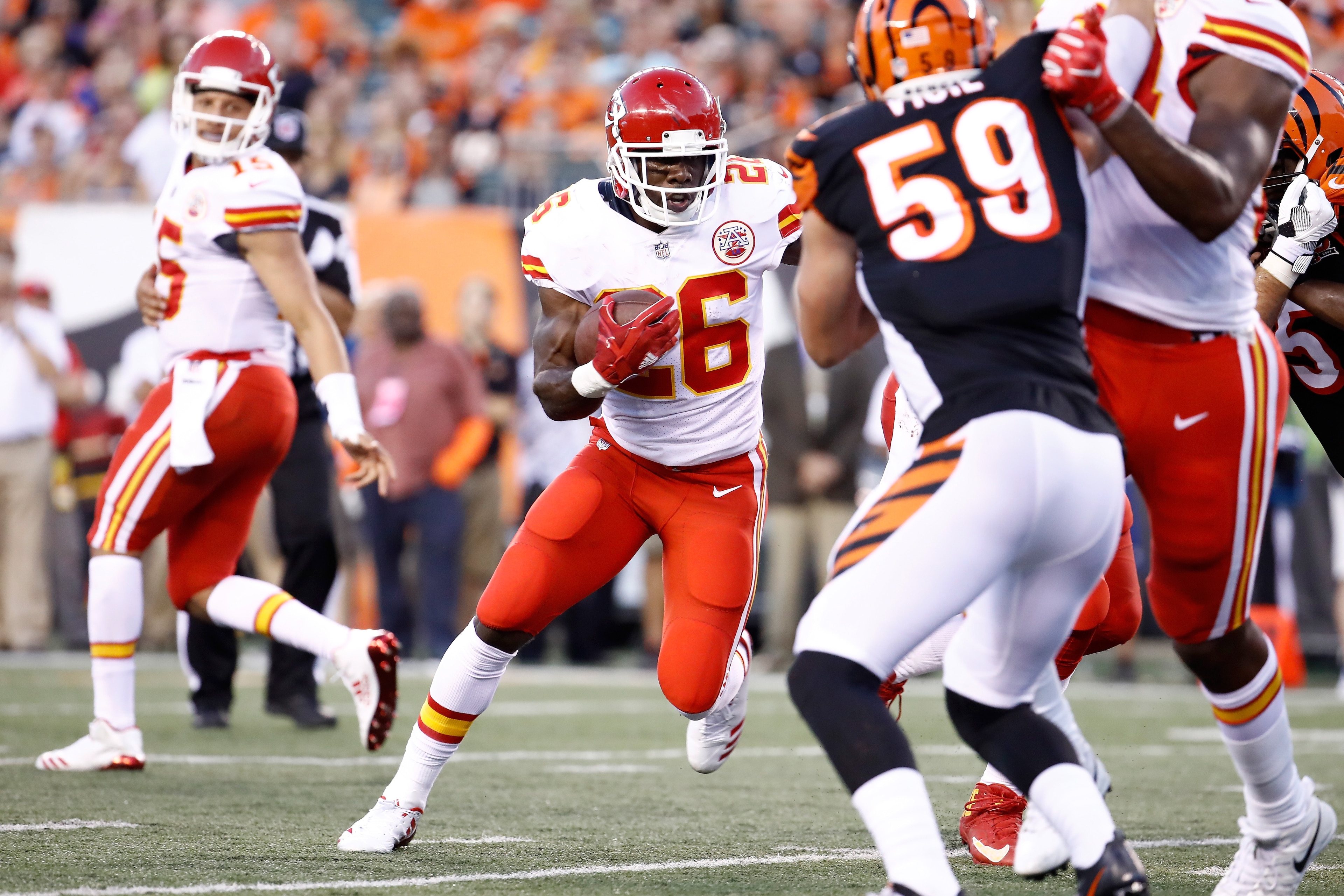 CINCINNATI, OH - AUGUST 19:  C.J. Spiller #26  of the Kansas City Chiefs runs with the ball against the Cincinnati Bengals during the preseason game at Paul Brown Stadium on August 19, 2017 in Cincinnati, Ohio.  (Photo by Andy Lyons/Getty Images)