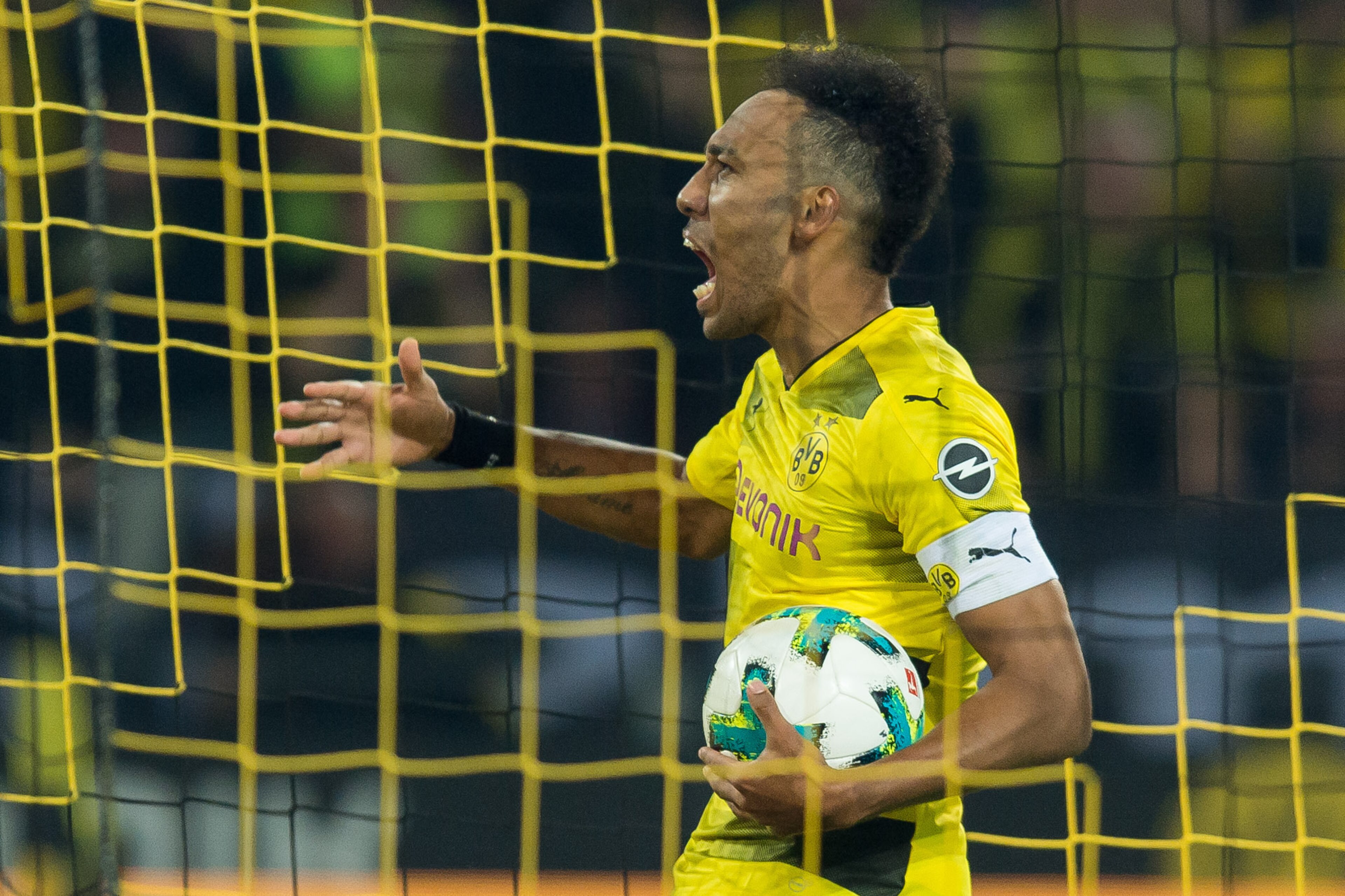 DORTMUND, GERMANY - OCTOBER 14: Pierre-Emerick Aubameyang of Dortmund celebrates after scoring his team`s second goal during the Bundesliga match between Borussia Dortmund and RB Leipzig at Signal Iduna Park on October 14, 2017 in Dortmund, Germany. (Phot