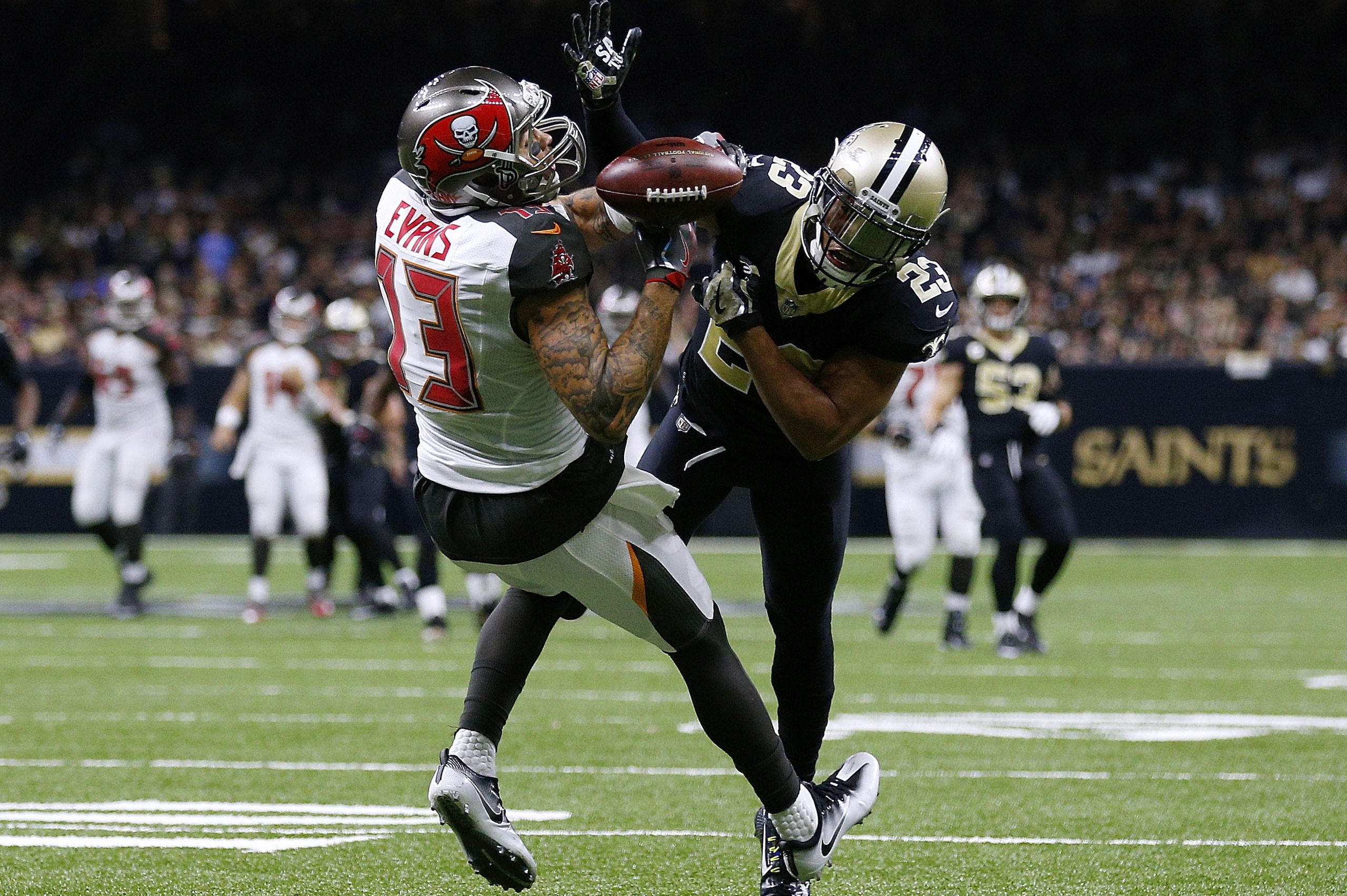 NEW ORLEANS, LA - NOVEMBER 05:  Marshon Lattimore #23 of the New Orleans Saints breaks up a pass intended for Mike Evans #13 of the Tampa Bay Buccaneers during the second half of a game at Mercedes-Benz Superdome on November 5, 2017 in New Orleans, Louisi