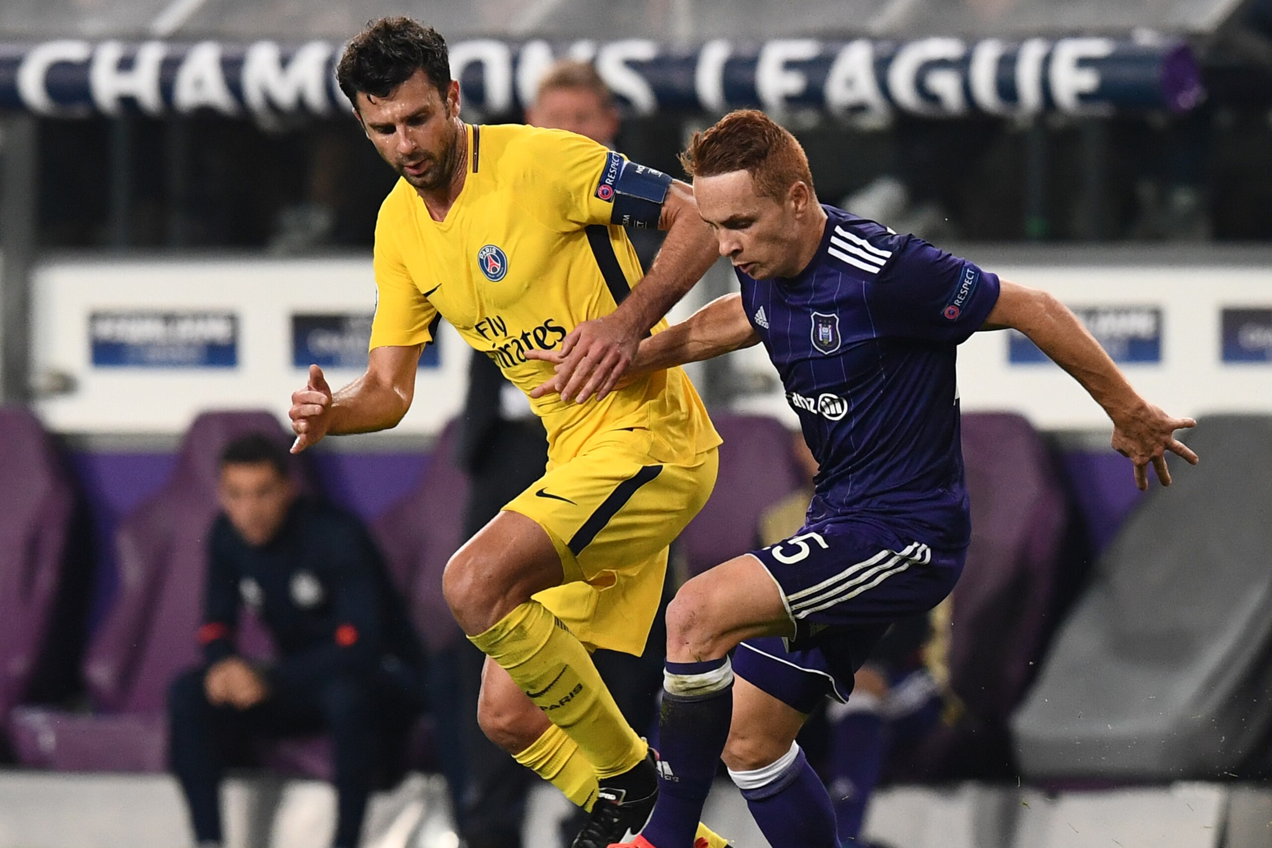 Paris Saint-Germain's Italian midfielder Thiago Motta (L) vies with Anderlecht's French midfielder Adrien Trebel during the UEFA Champions League Group B football match between RSC Anderlecht and Paris Saint-Germain (PSG) at the Constant Vanden Stock Stad