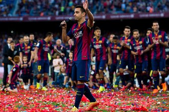 BARCELONA, SPAIN - MAY 23: Xavi Hernandez of FC Barcelona waves to the spectators after the La Liga match between FC Barcelona and RC Deportivo La Coruna at Camp Nou on May 23, 2015 in Barcelona, Spain. (Photo by Alex Caparros/Getty Images)