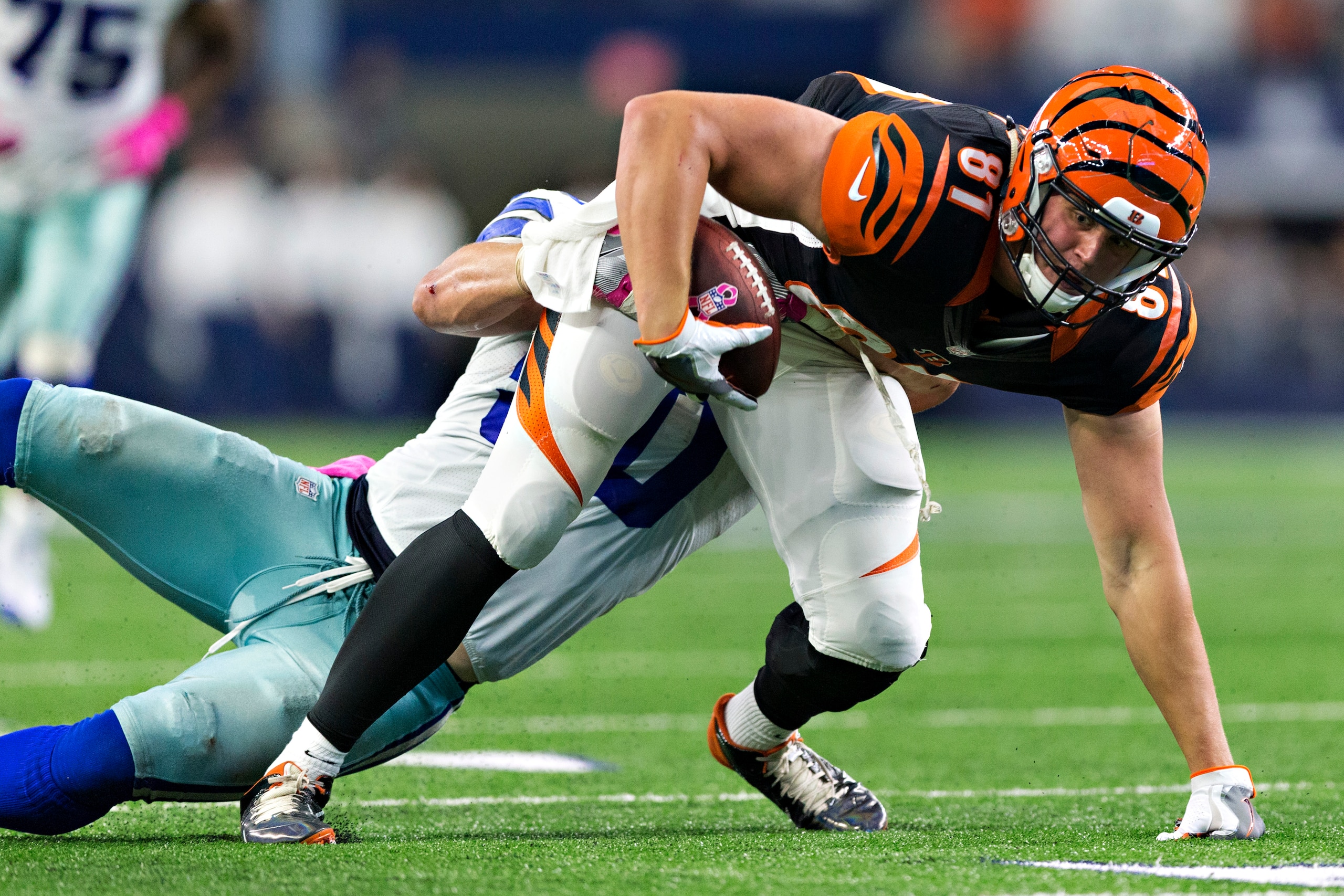 ARLINGTON, TX - OCTOBER 09: Tyler Kroft #81 of the Cincinnati Bengals is tackled by Sean Lee #50 of the Dallas Cowboys at AT&T Stadium on October 9, 2016 in Arlington, Texas. The Cowboys defeated the Bengals 28-14.  (Photo by Wesley Hitt/Getty Images)