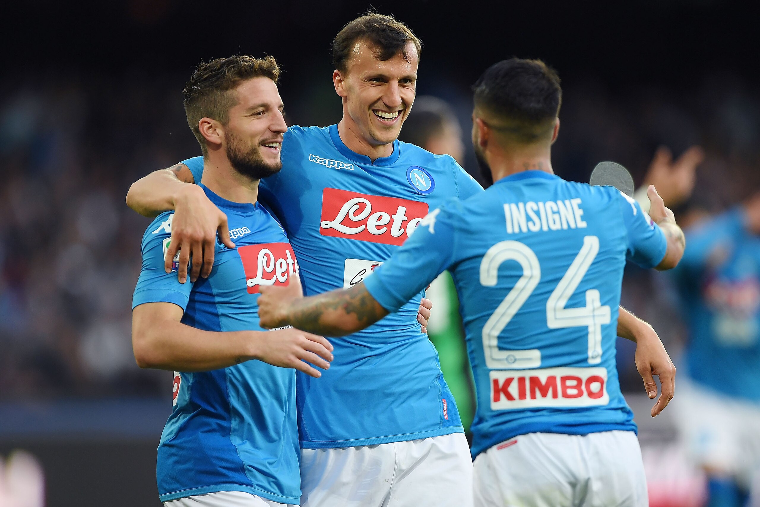 NAPLES, ITALY - OCTOBER 29:  Vlad Chiriches, Dries Mertens and Lorenzo Insigne of SSC Napoli celebrate the 3-1 goal scored by Dries Mertens during the Serie A match between SSC Napoli and US Sassuolo at Stadio San Paolo on October 29, 2017 in Naples, Ital