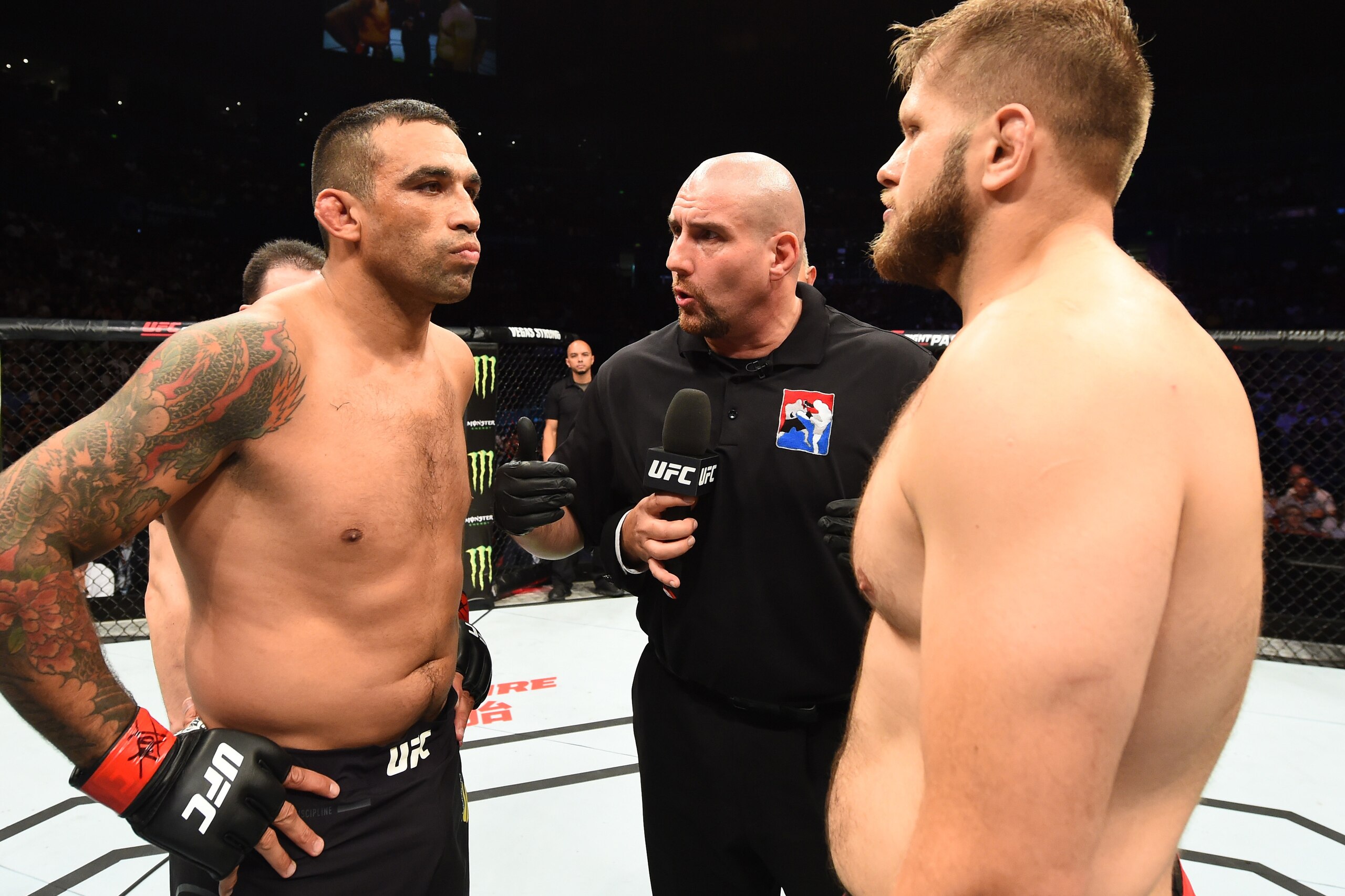 SYDNEY, AUSTRALIA - NOVEMBER 19:  (L-R) Fabricio Werdum of Brazil and Marcin Tybura of Poland face off in their heavyweight bout during the UFC Fight Night event inside the Qudos Bank Arena on November 19, 2017 in Sydney, Australia. (Photo by Josh Hedges/