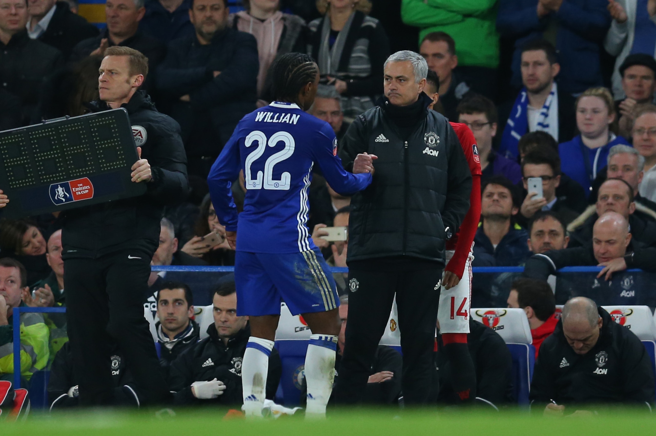 LONDON, ENGLAND - MARCH 13: Willian of Chelsea is greeted by Jose Mourinho Manager of Manchester United as he substituted during The Emirates FA Cup Quarter-Final match between Chelsea and Manchester United at Stamford Bridge on March 13, 2017 in London, 