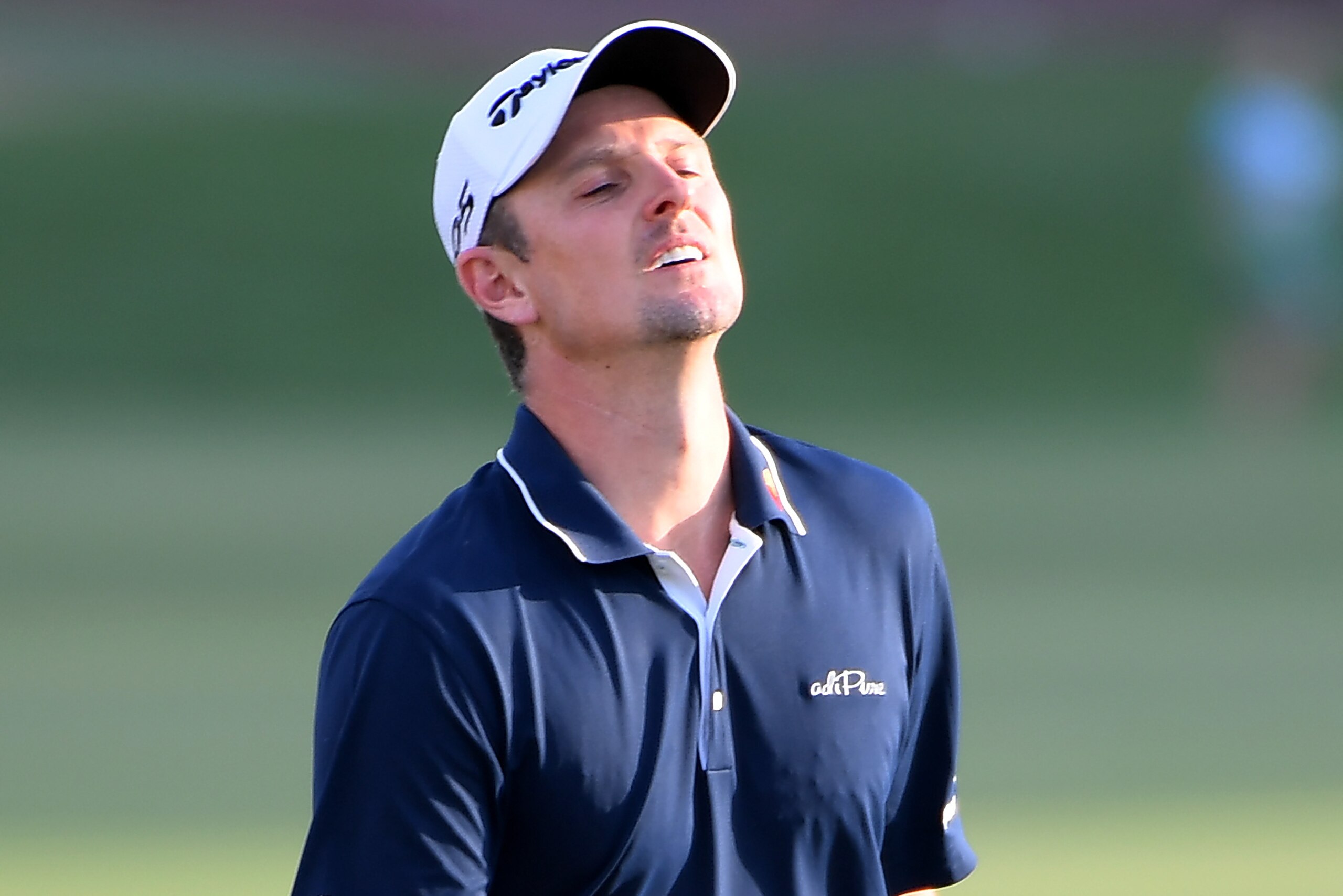 DUBAI, UNITED ARAB EMIRATES - NOVEMBER 19:  Justin Rose of England walks down the 18th hole during the final round of the DP World Tour Championship at Jumeirah Golf Estates on November 19, 2017 in Dubai, United Arab Emirates.  (Photo by Ross Kinnaird/Get